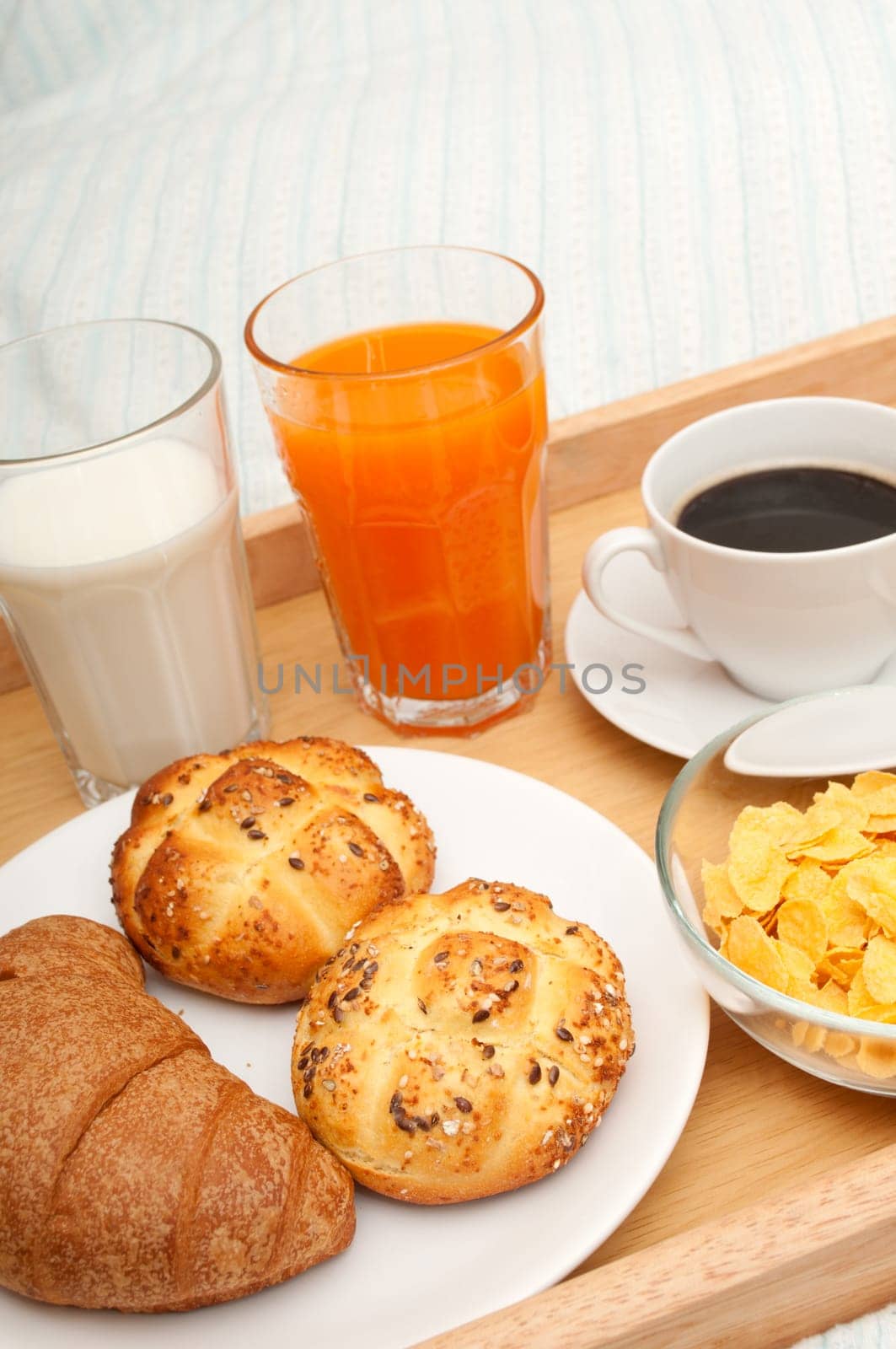 Breakfast in Bed - Corn Flakes, Coffee, Croissant, Orange Juice, Coffee, Milk and Rolls