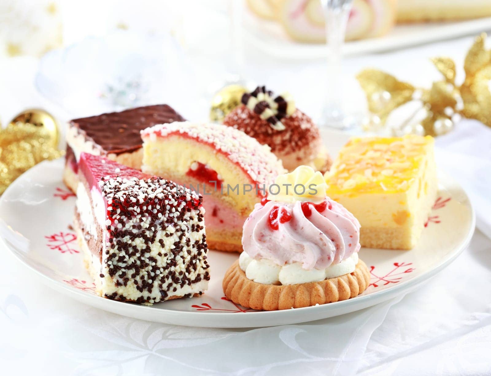 Assorted whipped cream cakes and other desserts