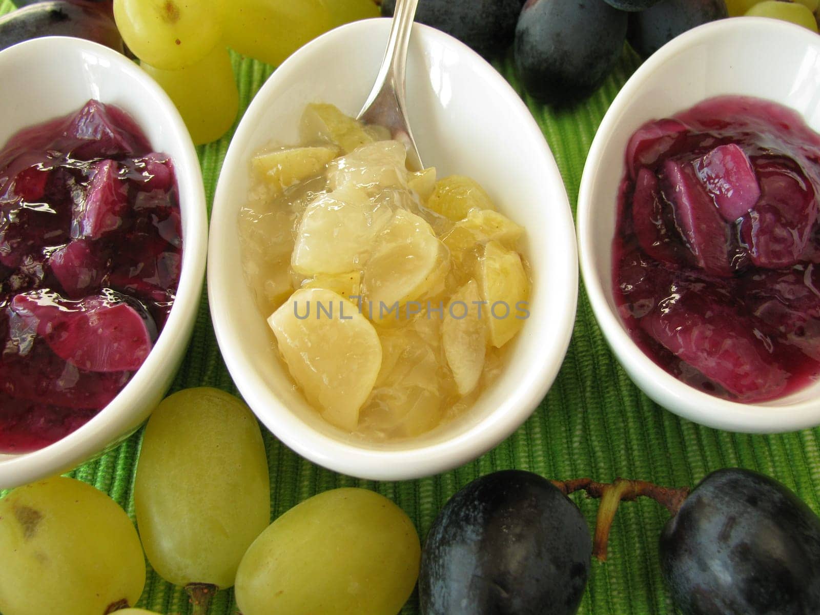 Small bowls of grape jam