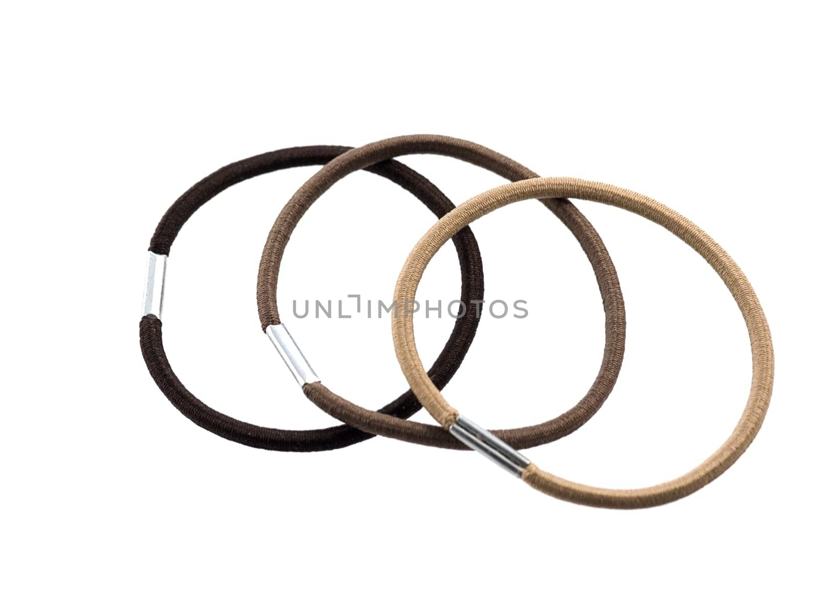 close-up of elastic bands for hair isolated on white background