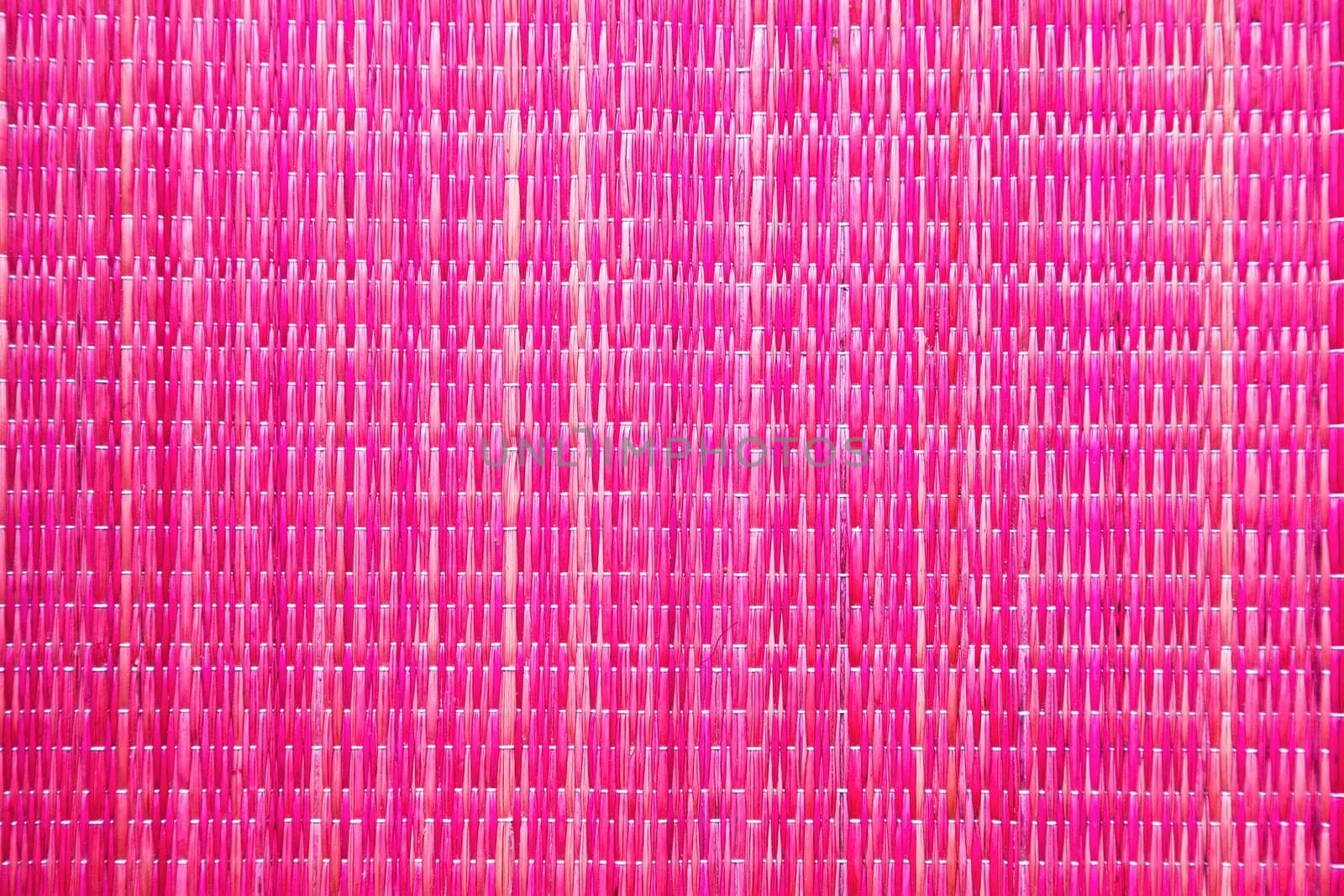 horizontal or vertical bright crimson pink raffia background texture patterns of a table runner