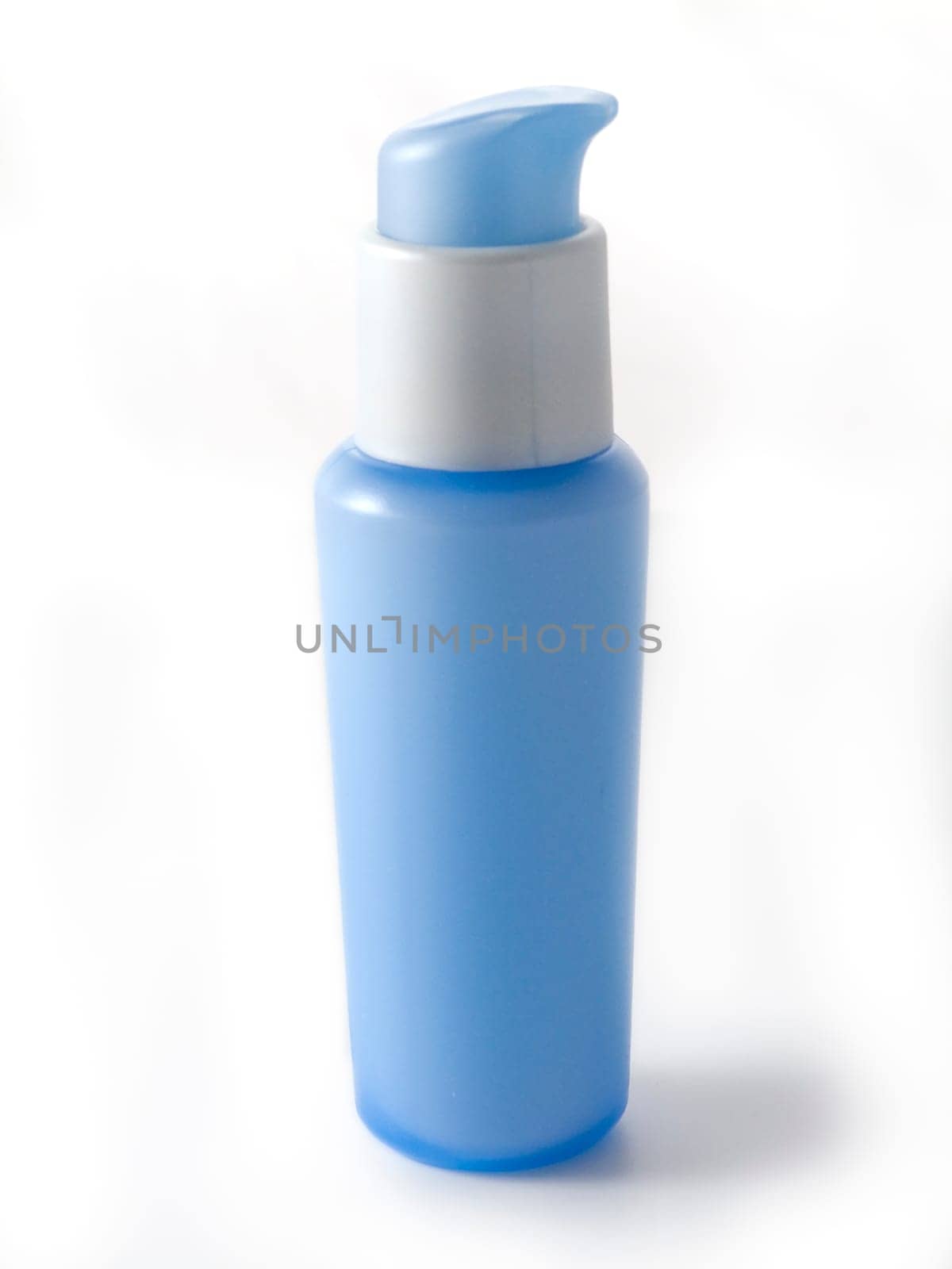 blue cosmetic bottles without labels isolated on white background
