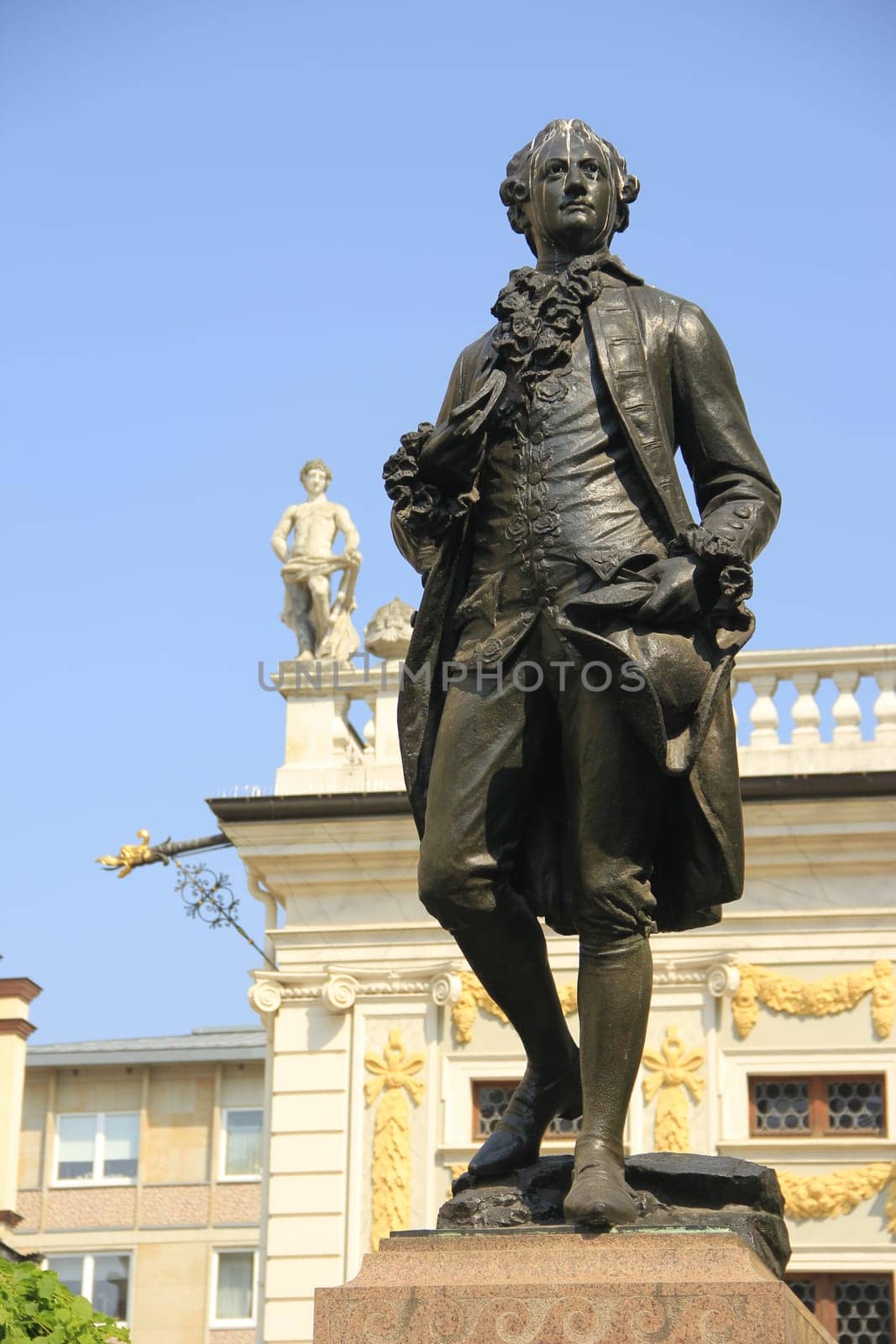 Goethe monument in front of the old stock exchange,in the background the back of the old town hall,Leipzig,Saxony,Germany