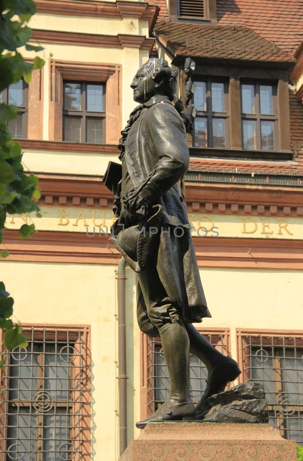 Goethe monument in front of the old stock exchange,in the background the back of the old town hall,Leipzig,Saxony,Germany