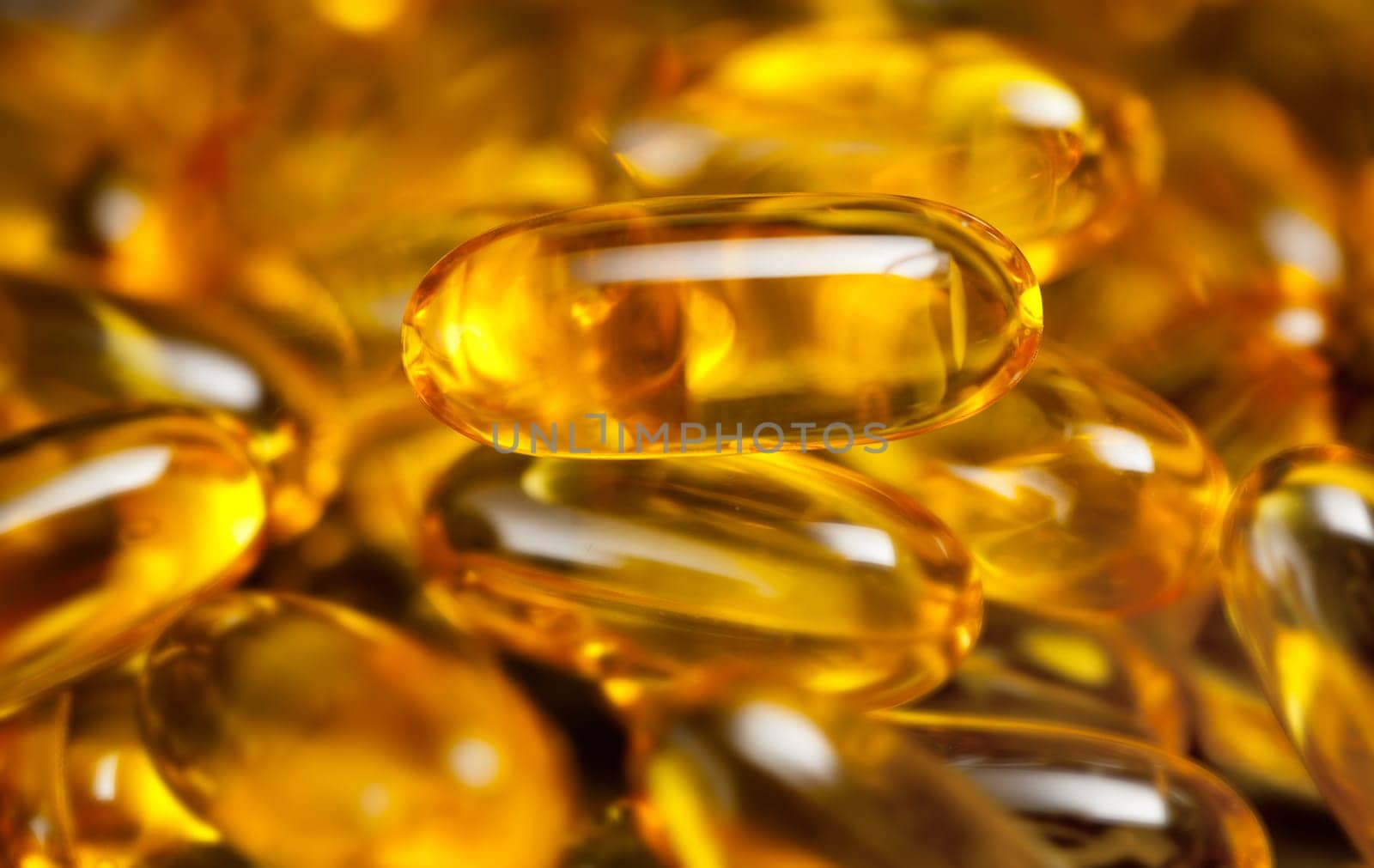 Macro image of a pile of fish oil or omega3 capsules for health