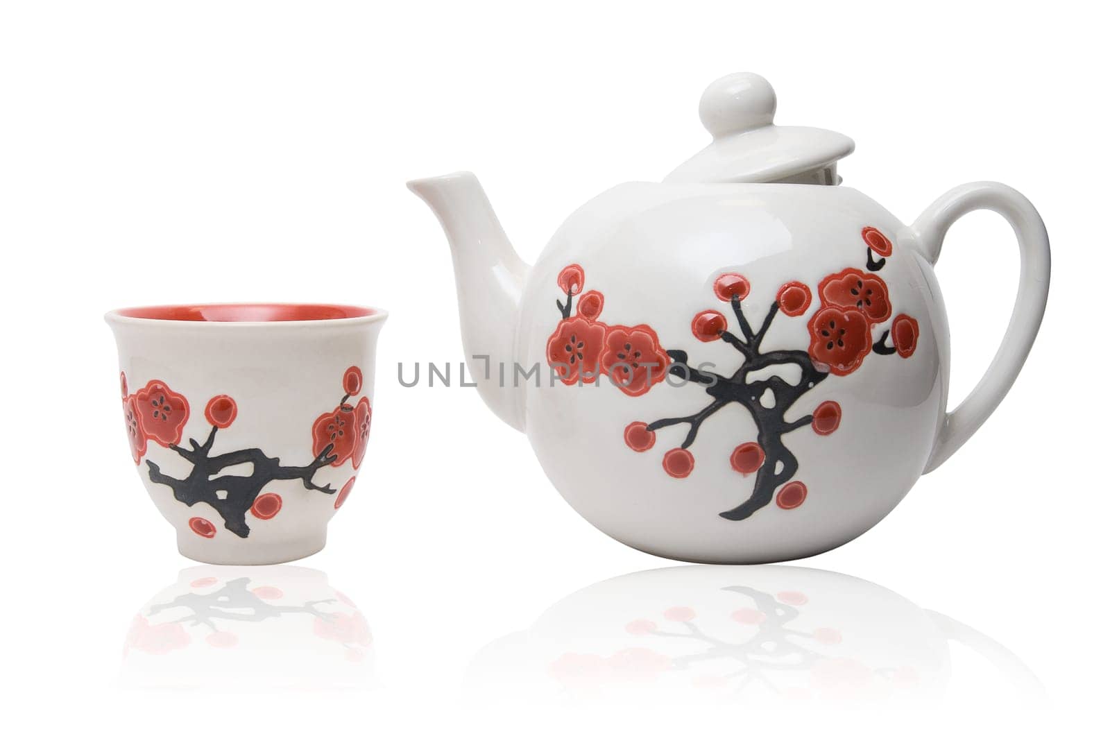 Tea-things in asian style with flowers. Isolated on white.