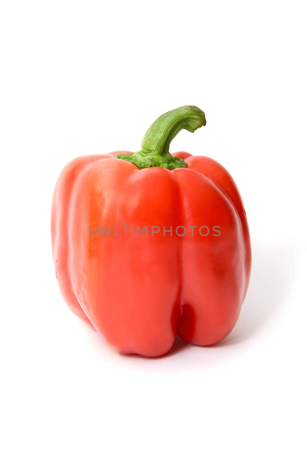 A red pepper on a white background
