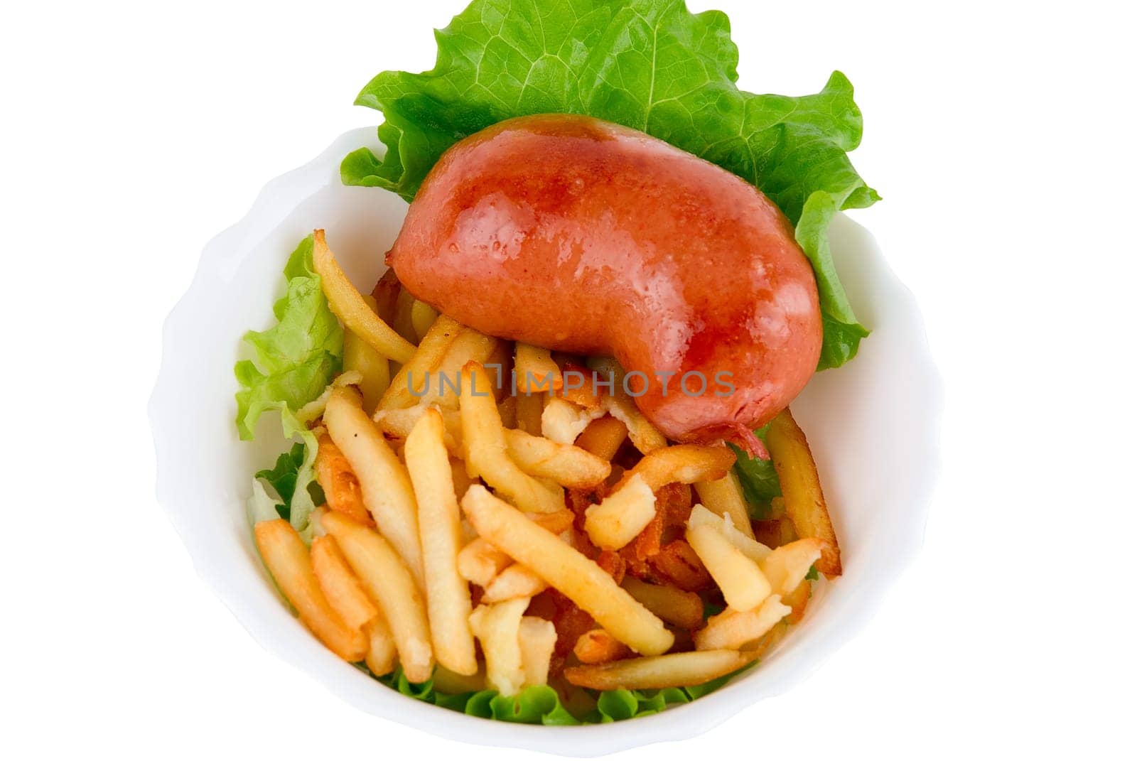 Close-up of Delicious sausages and French fried potatoes on white