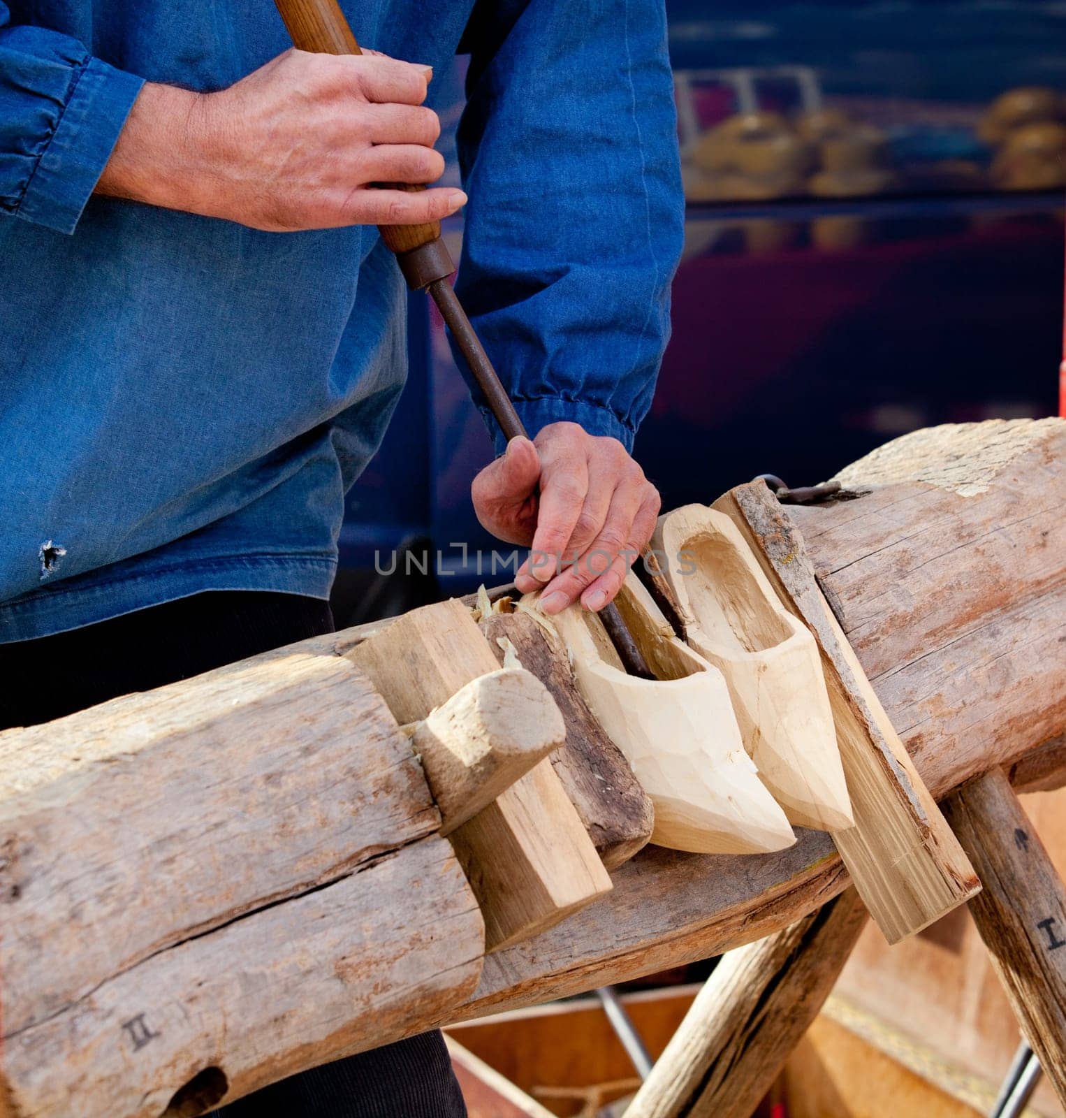 making of wooden shoes. ShoesTraditional skill of making Dutch