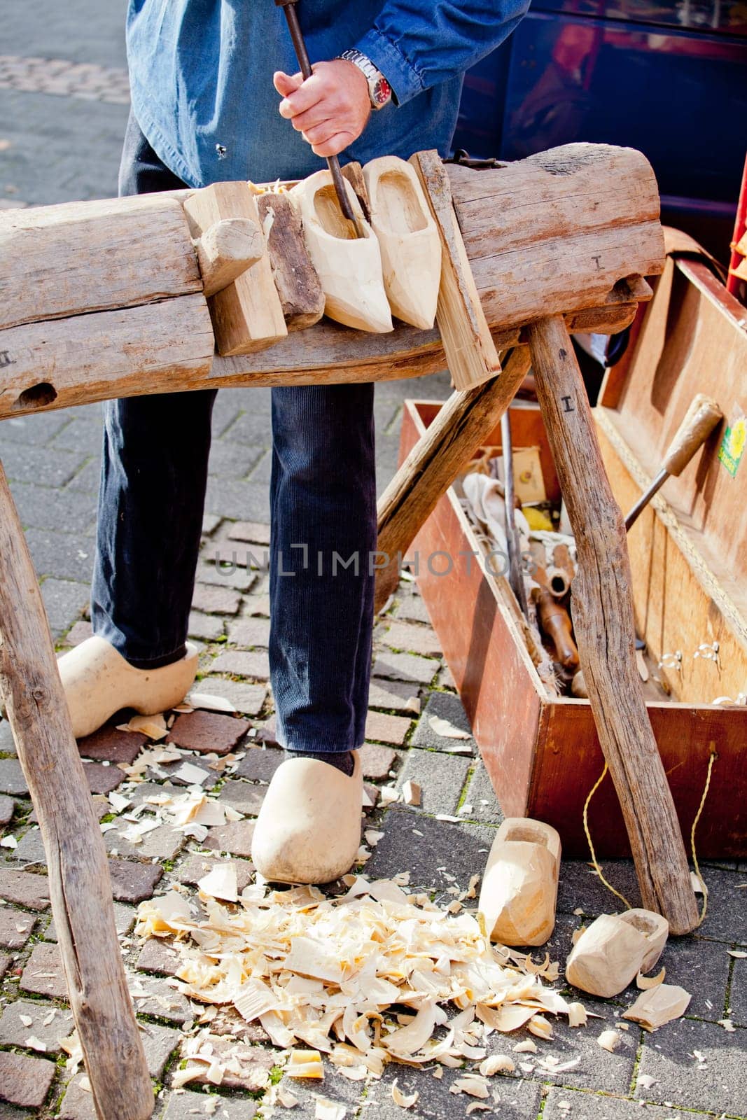 making of wooden shoes. ShoesTraditional skill of making Dutch