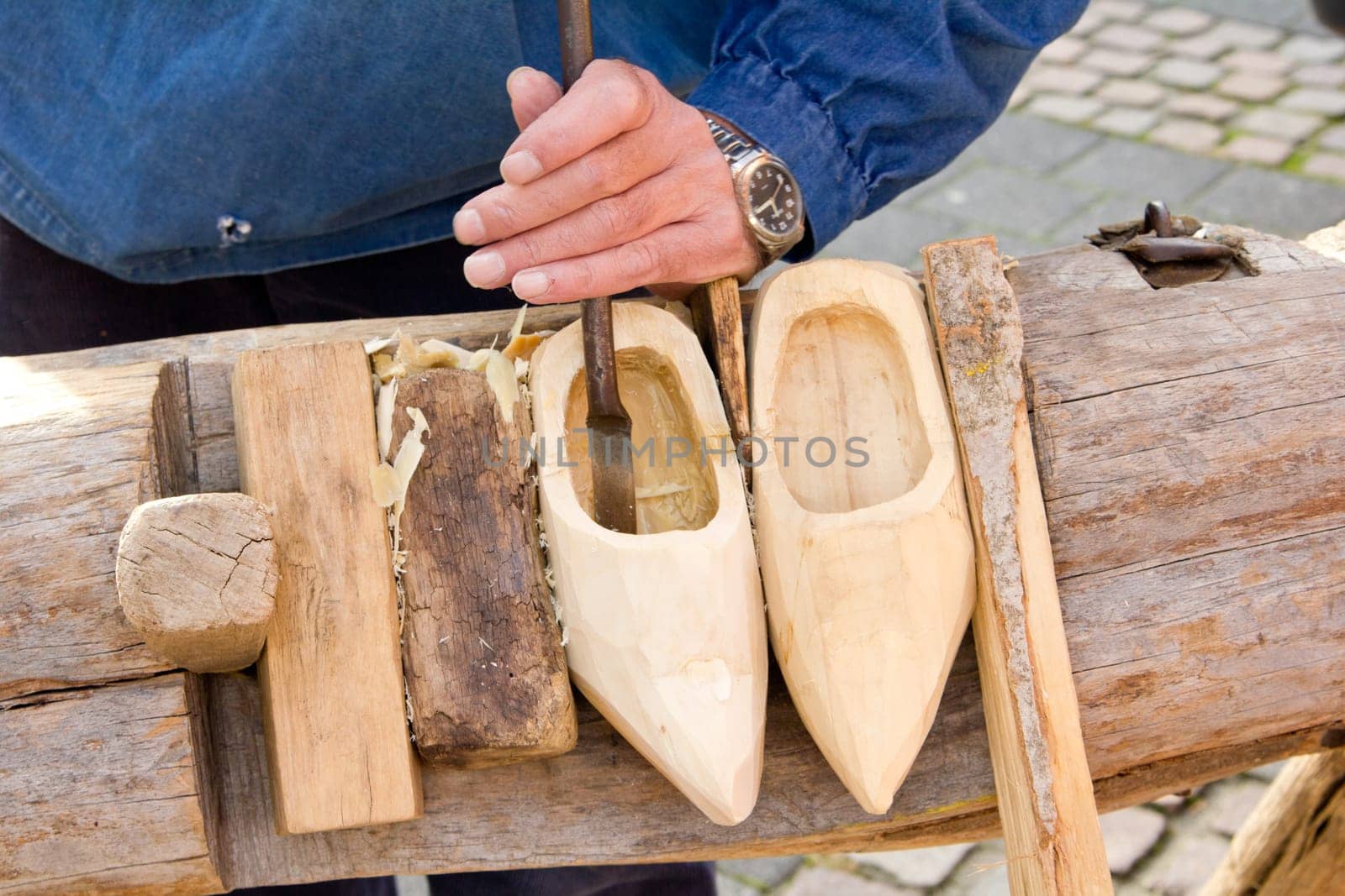 making of wooden shoes. ShoesTraditional skill of making Dutch