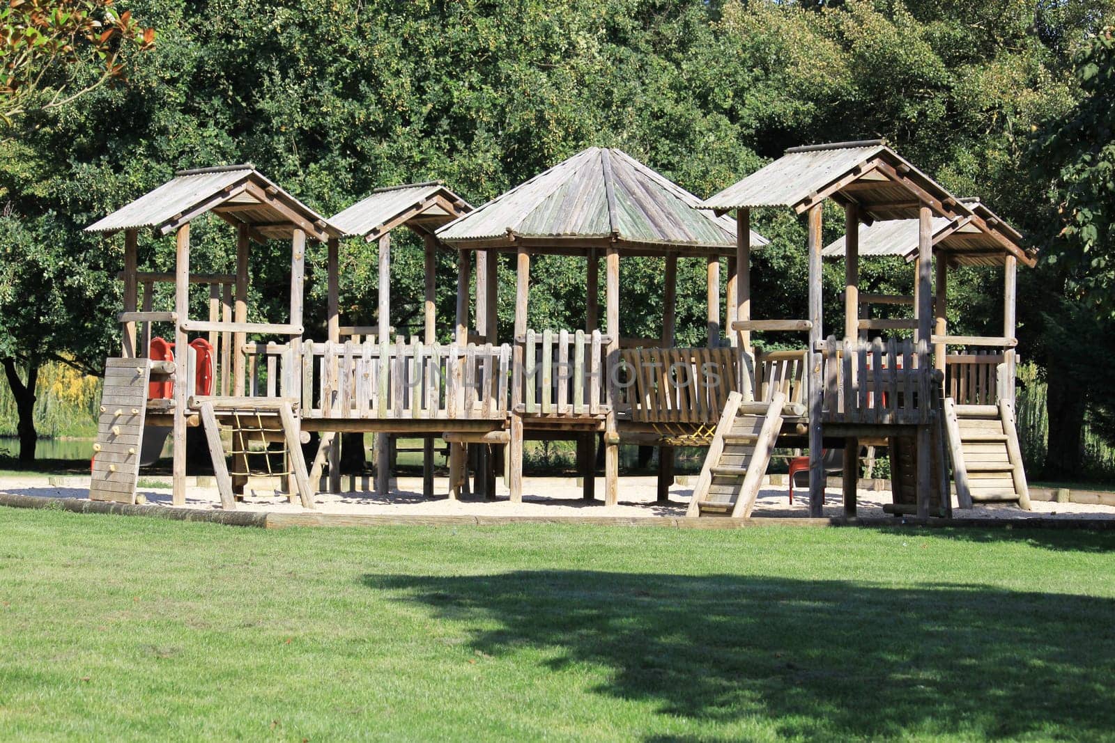 building a playground in an amusement park for children near a lake
