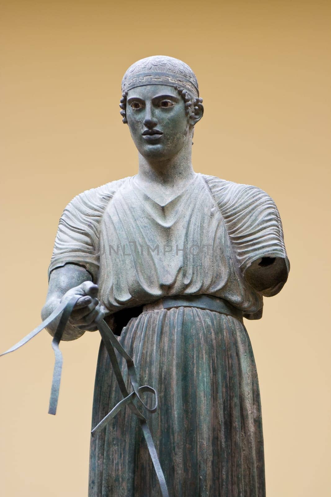 image of the famous sculpture the bronze charioteer in Greece