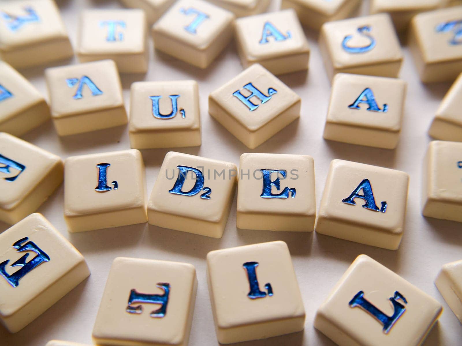 Idea, single word, text (scrabble)