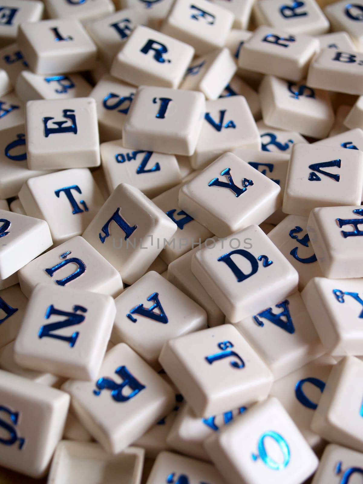 Random scrabble pieces background texture.