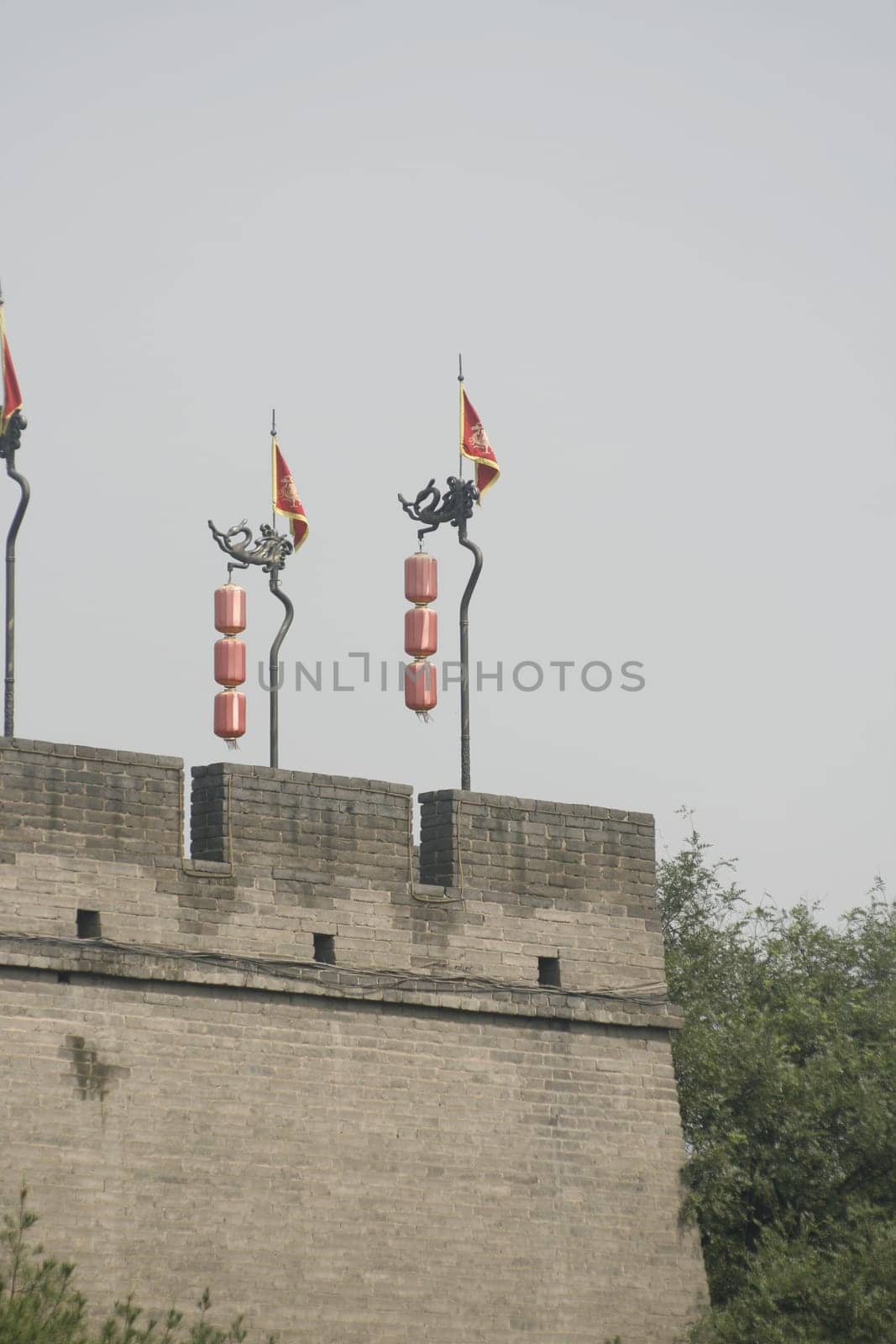 Xian Old Town,view of the city wall - lanterns and flag