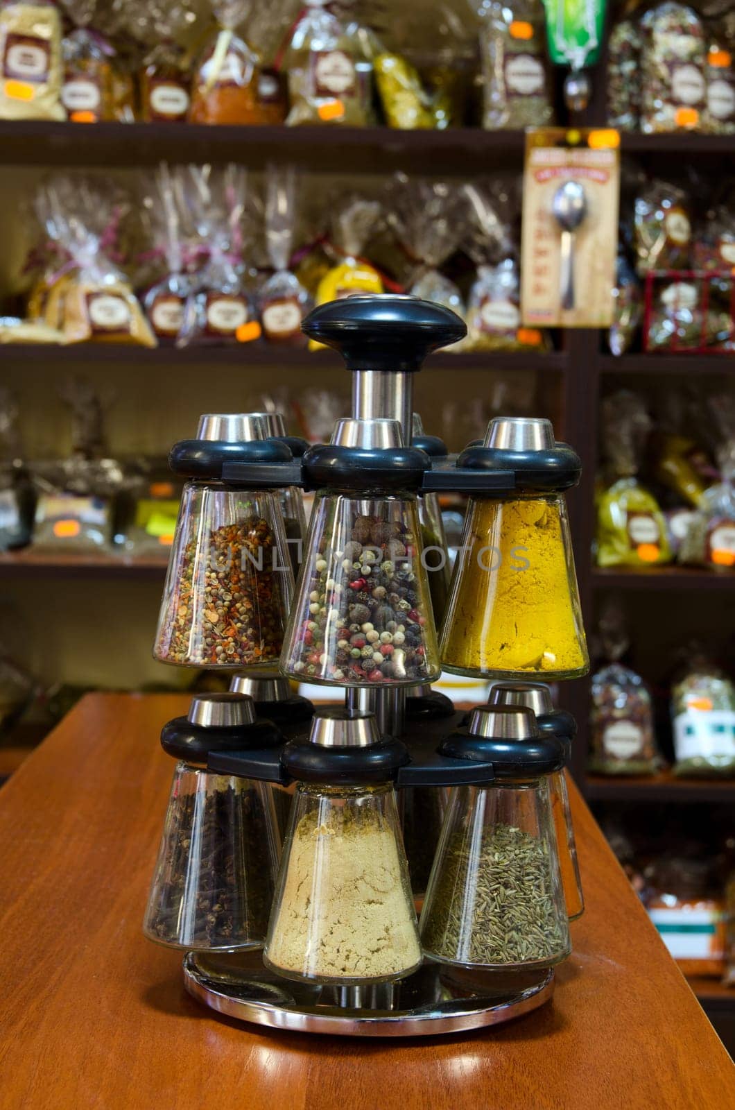 Different spices on the counter of market