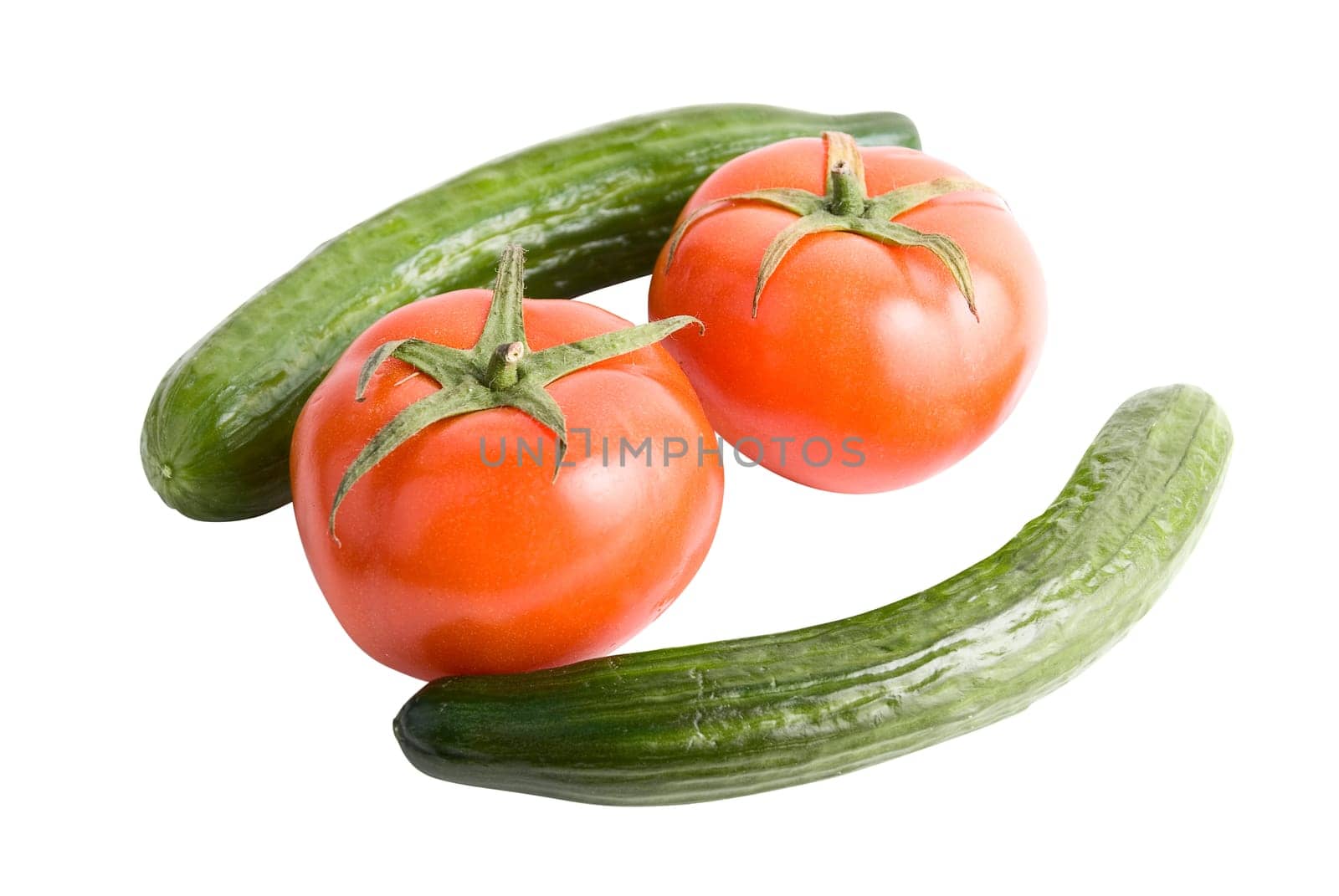 Tomatoes and cucumbers on a white background