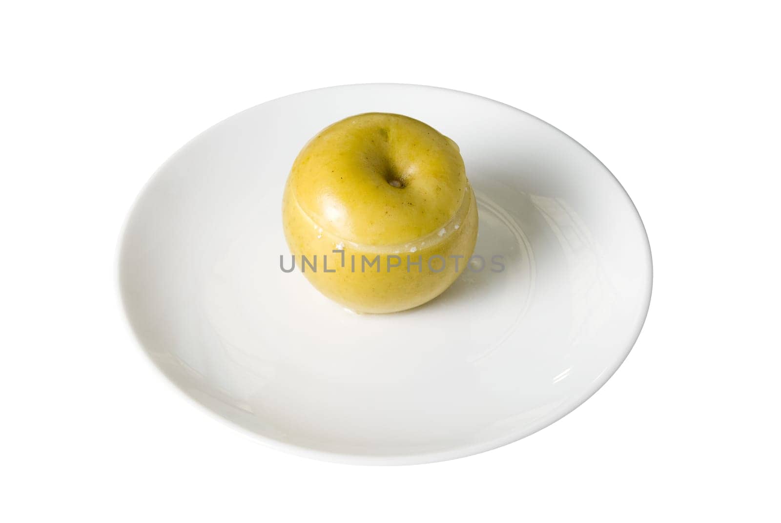 Apple dessert at plate isolated on white