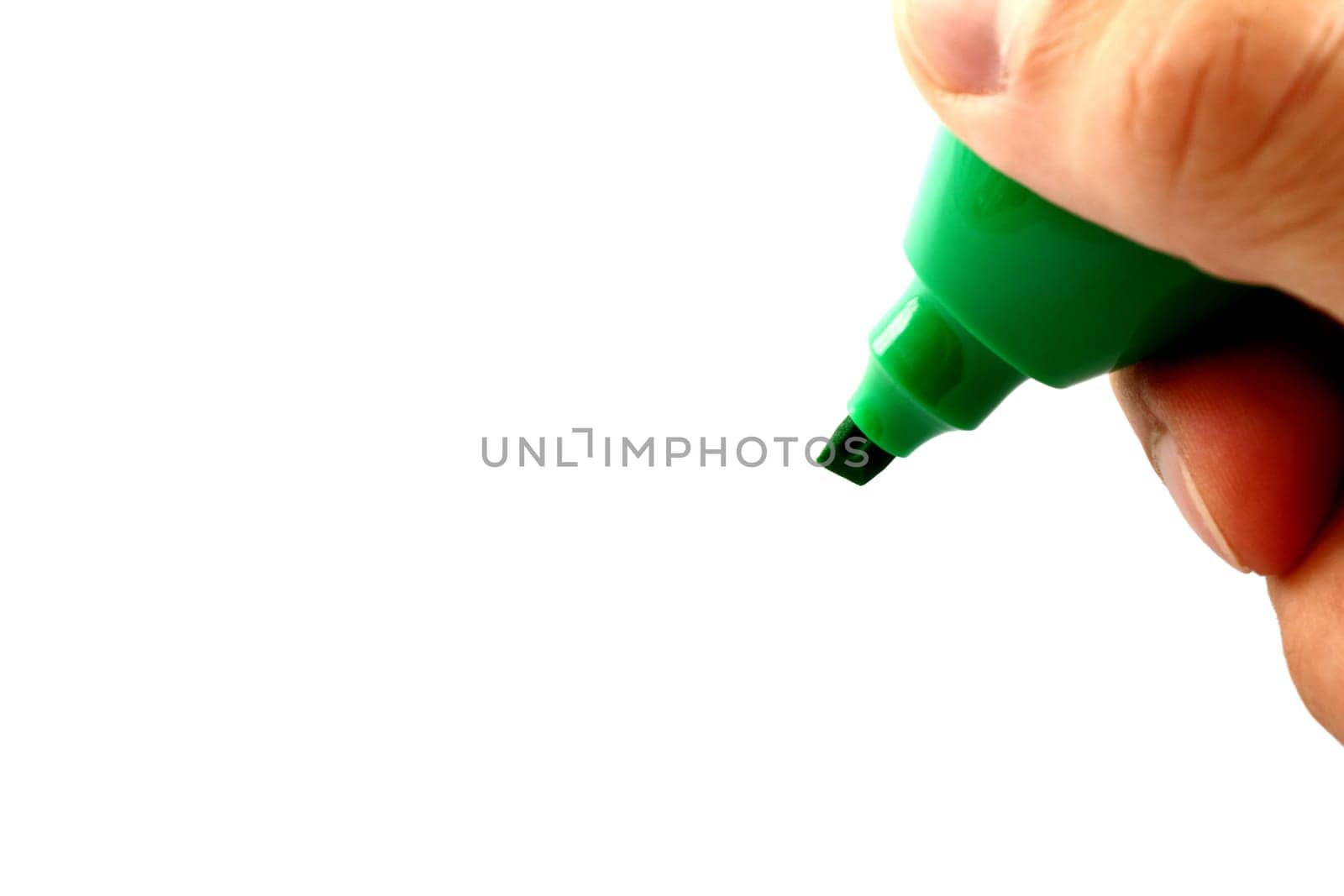 Hand with green pencil