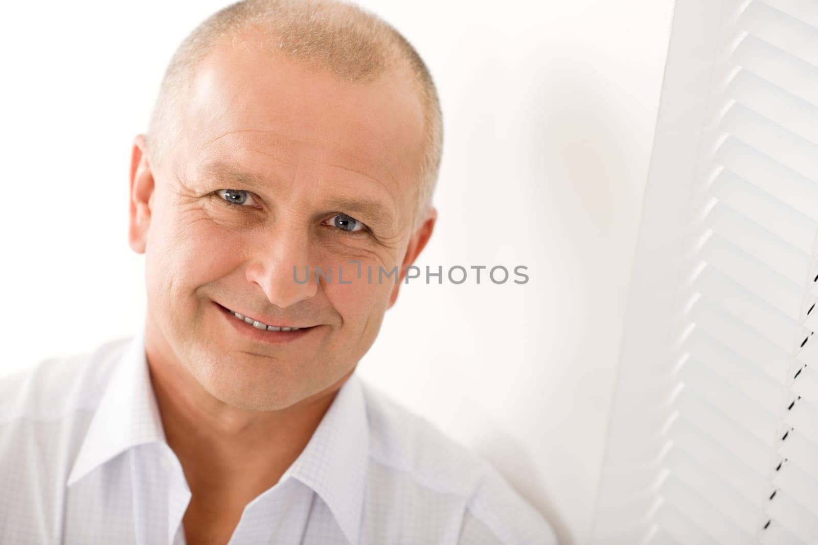 Happy successful mature businessman professional close-up portrait smiling white background