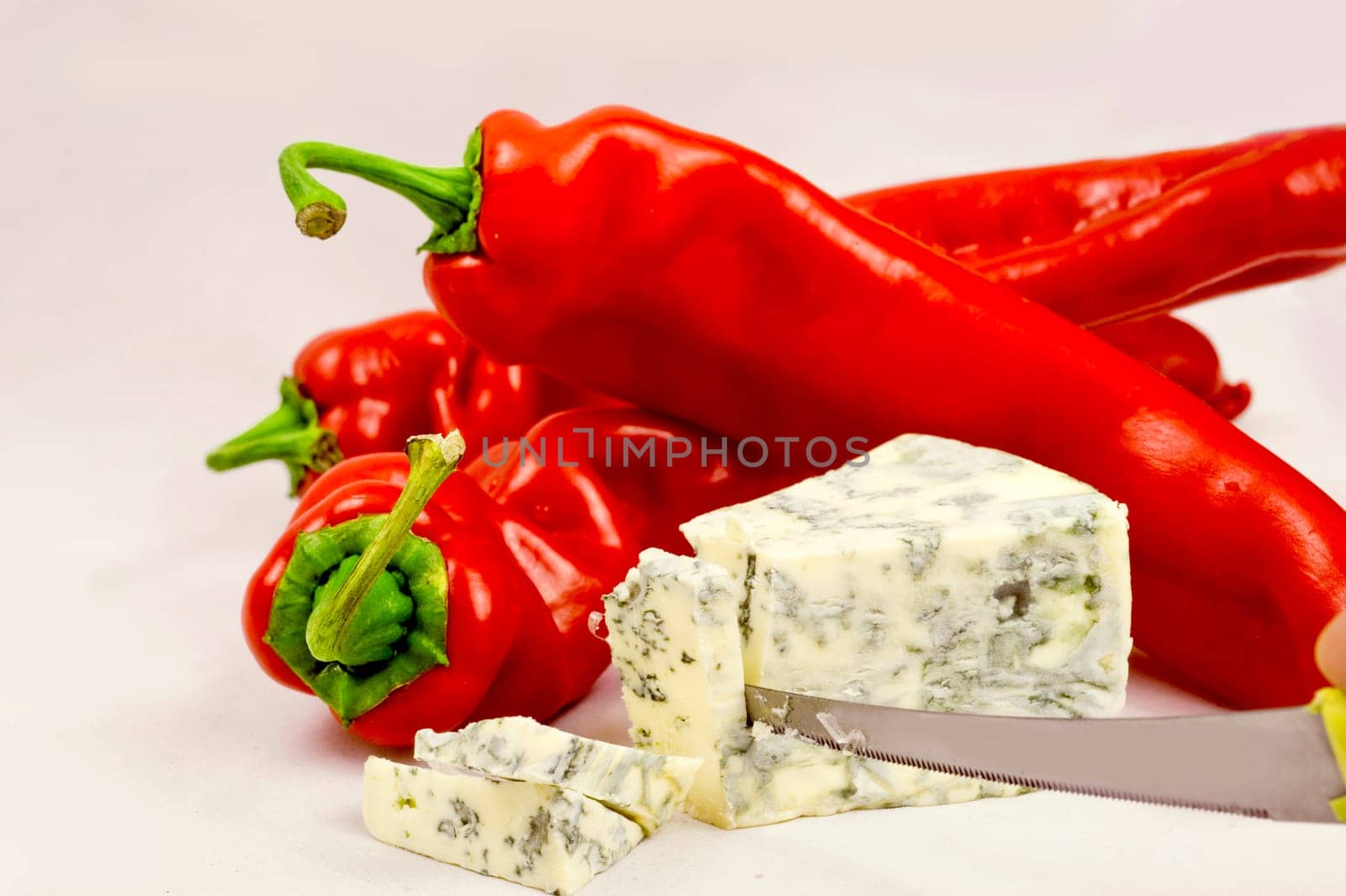 Red papper and cheese on the white
