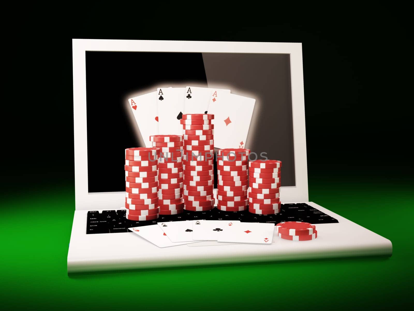 Gambling chips and poker cards on a laptop