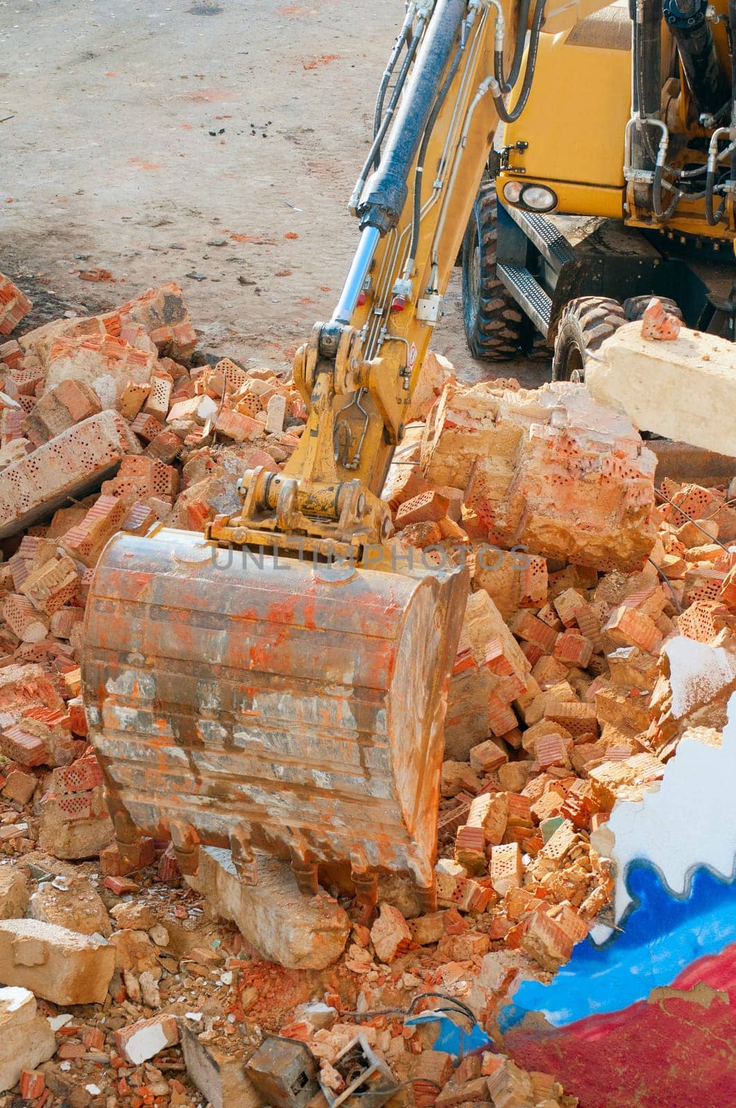 Detail of Digger in Building Under Demolition