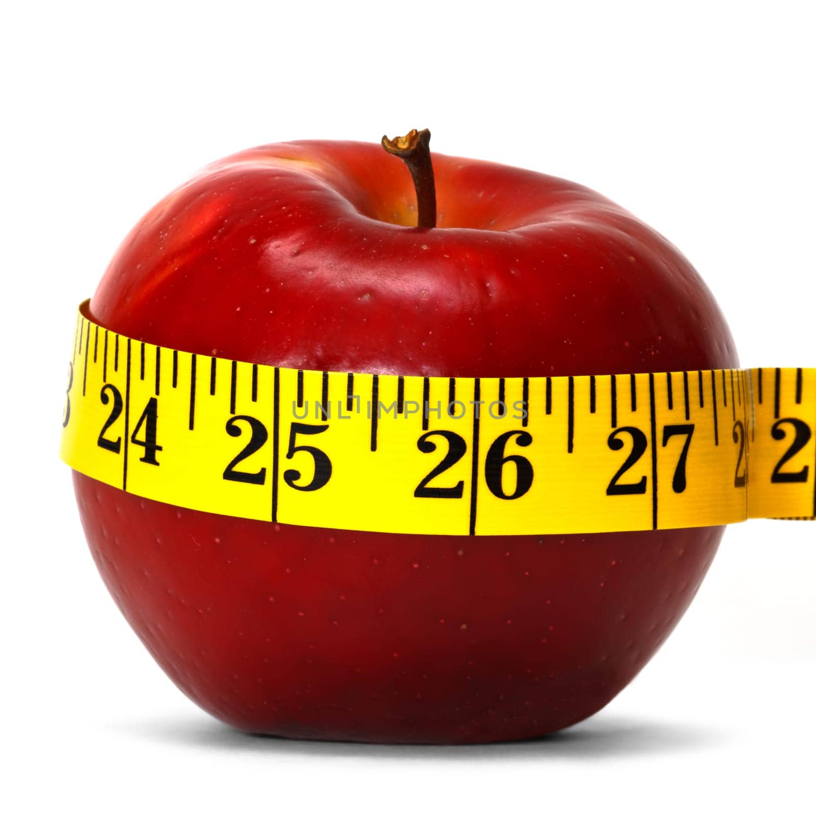 concept of weight loss with apple and measuring tape