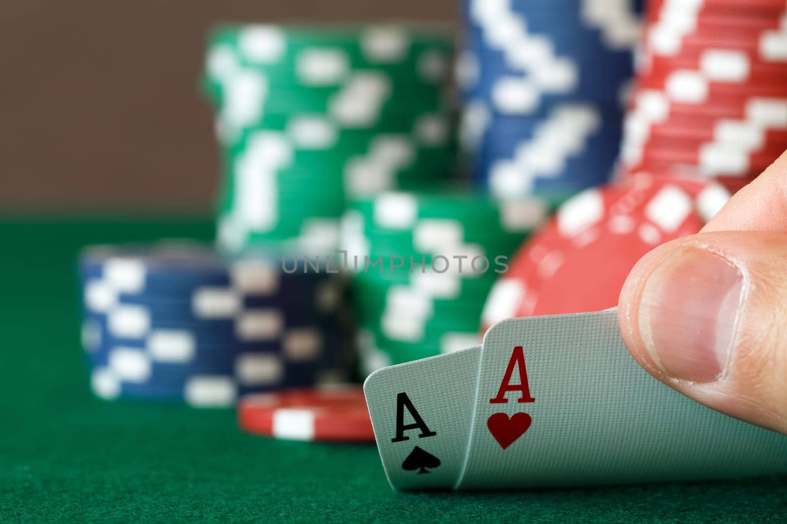 players hand, two aces