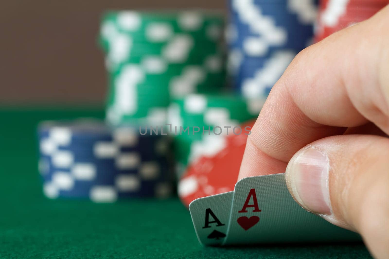 players hand, two aces