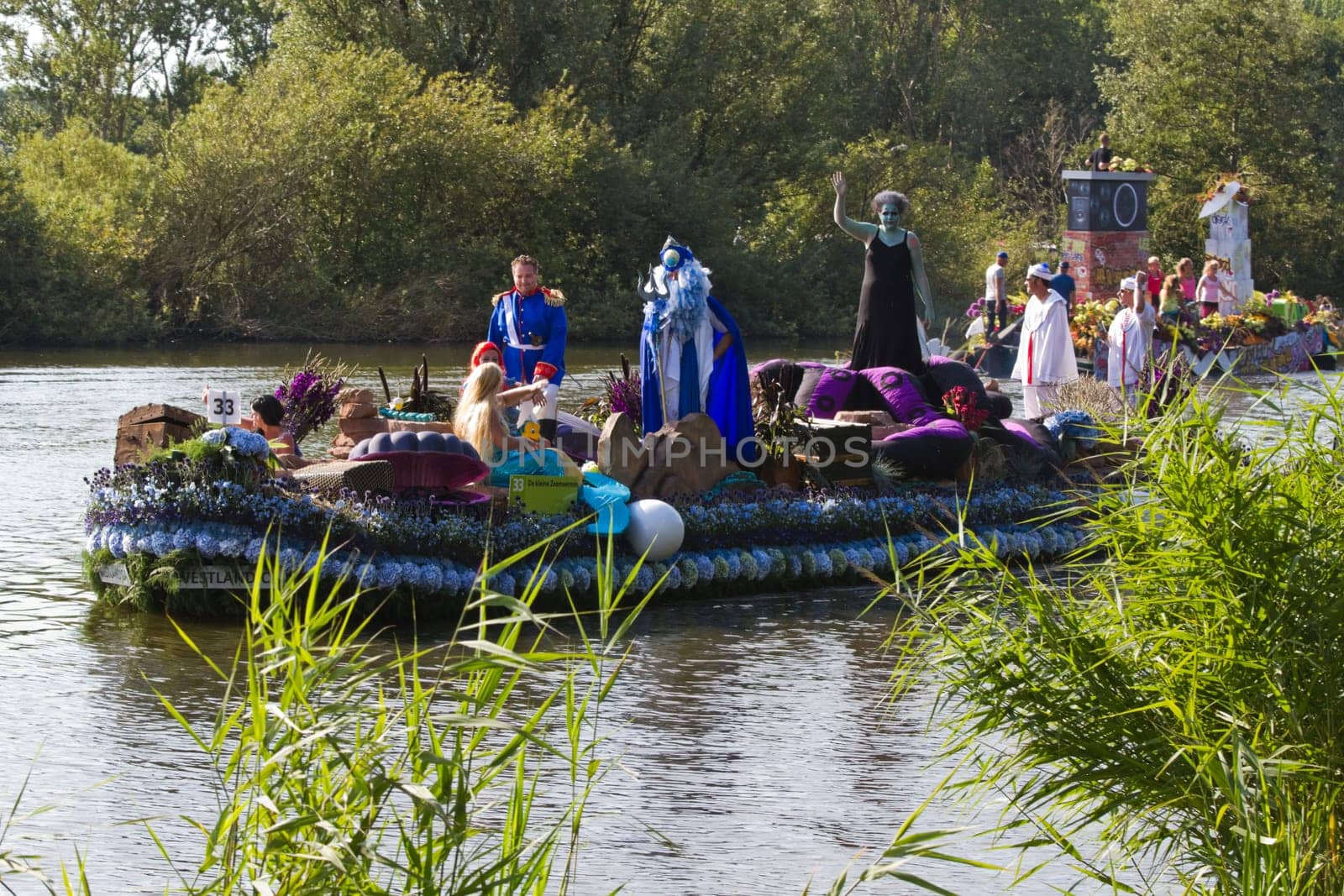 VLAARDINGEN - AUGUST 05: Each year this unique floating parade of beautiful decorated boats sail through the Westland. Theme this year: Theatre on water, August 05, 2011, Vlaardingen, the Netherlands