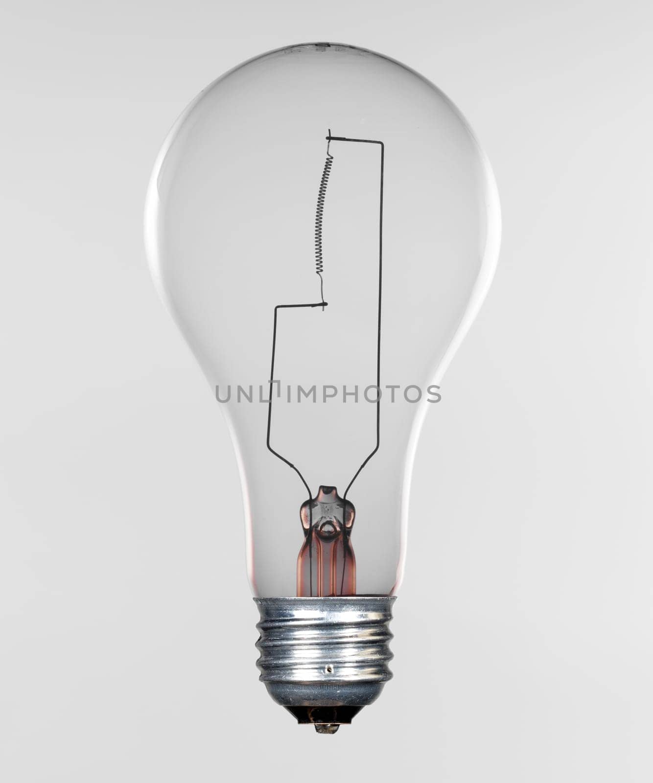 Glass incandescent tungsten filament light bulb due to be replaced due to energy concerns