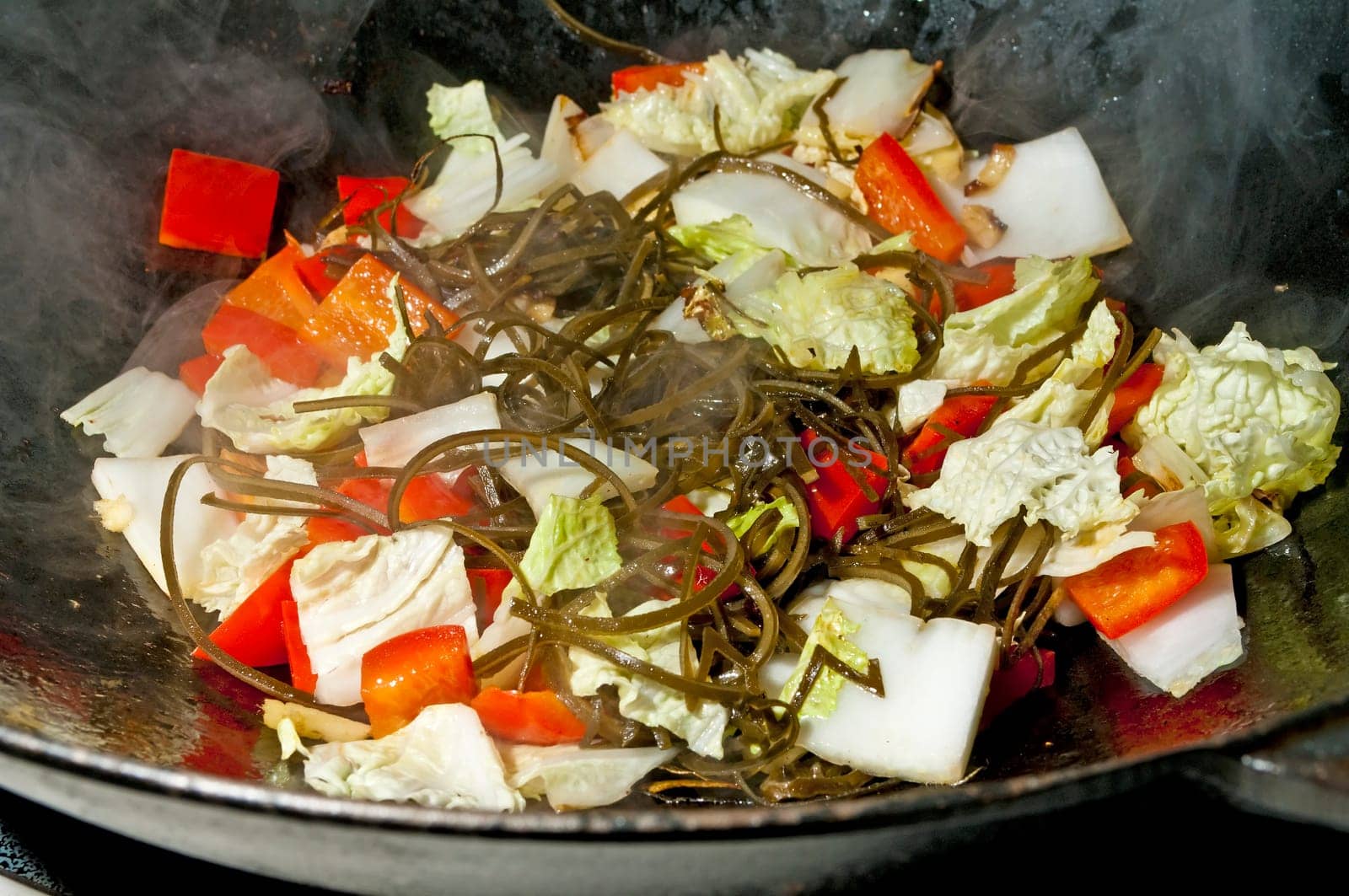 Algae,Chinese cabbage and peppers in a wok