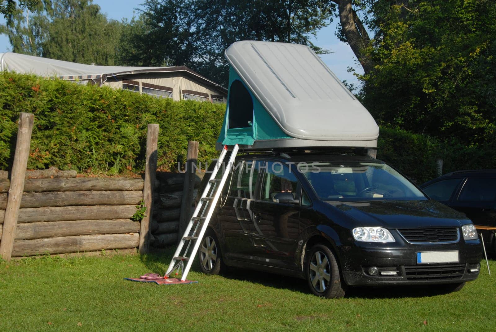 Camping holiday with car roof tent