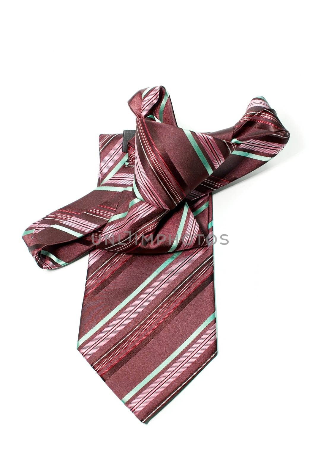 Red and green checkered man&#039 s necktie on white background