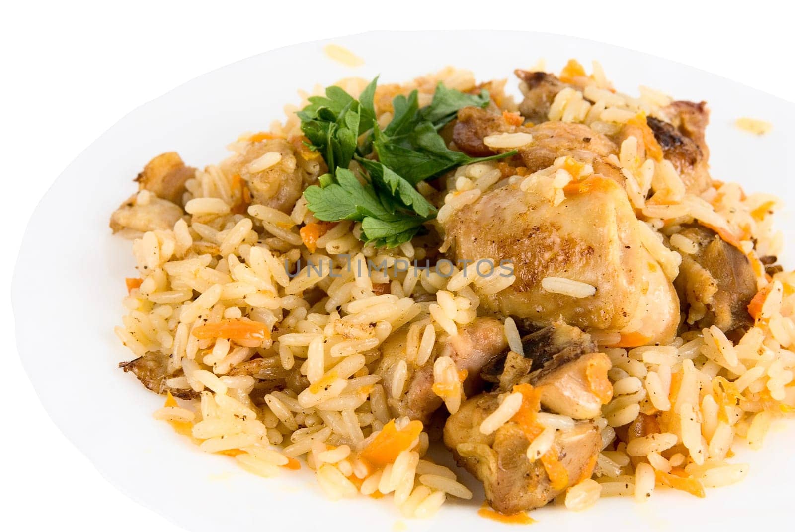 close-up of tasty pillau in dish on white