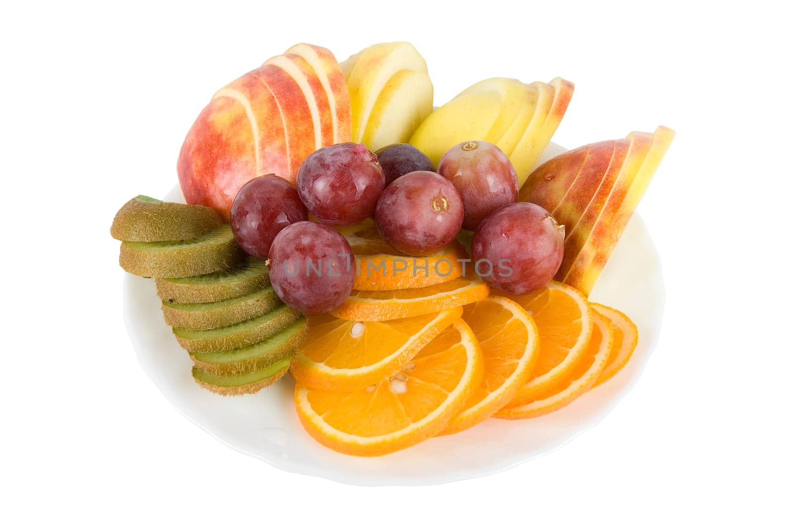 Colorful fruit salad with orange, kiwi, grapes and apple