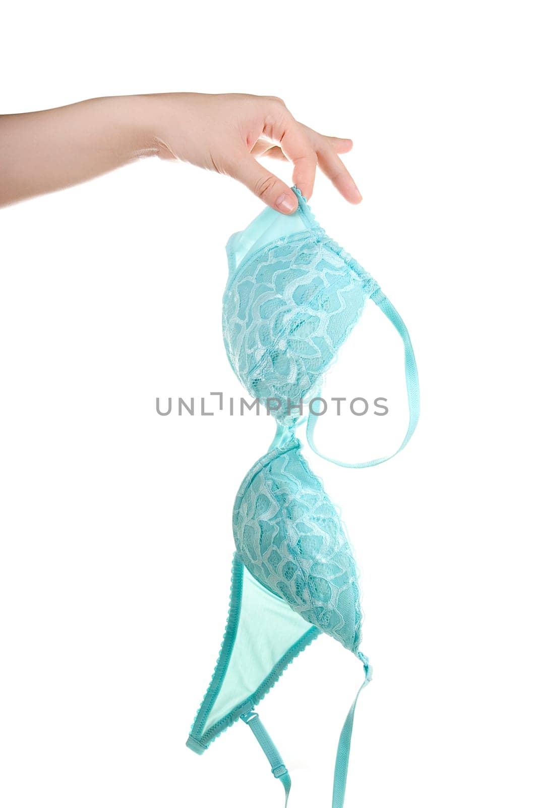 Woman hand hold blue bra isolated on white background