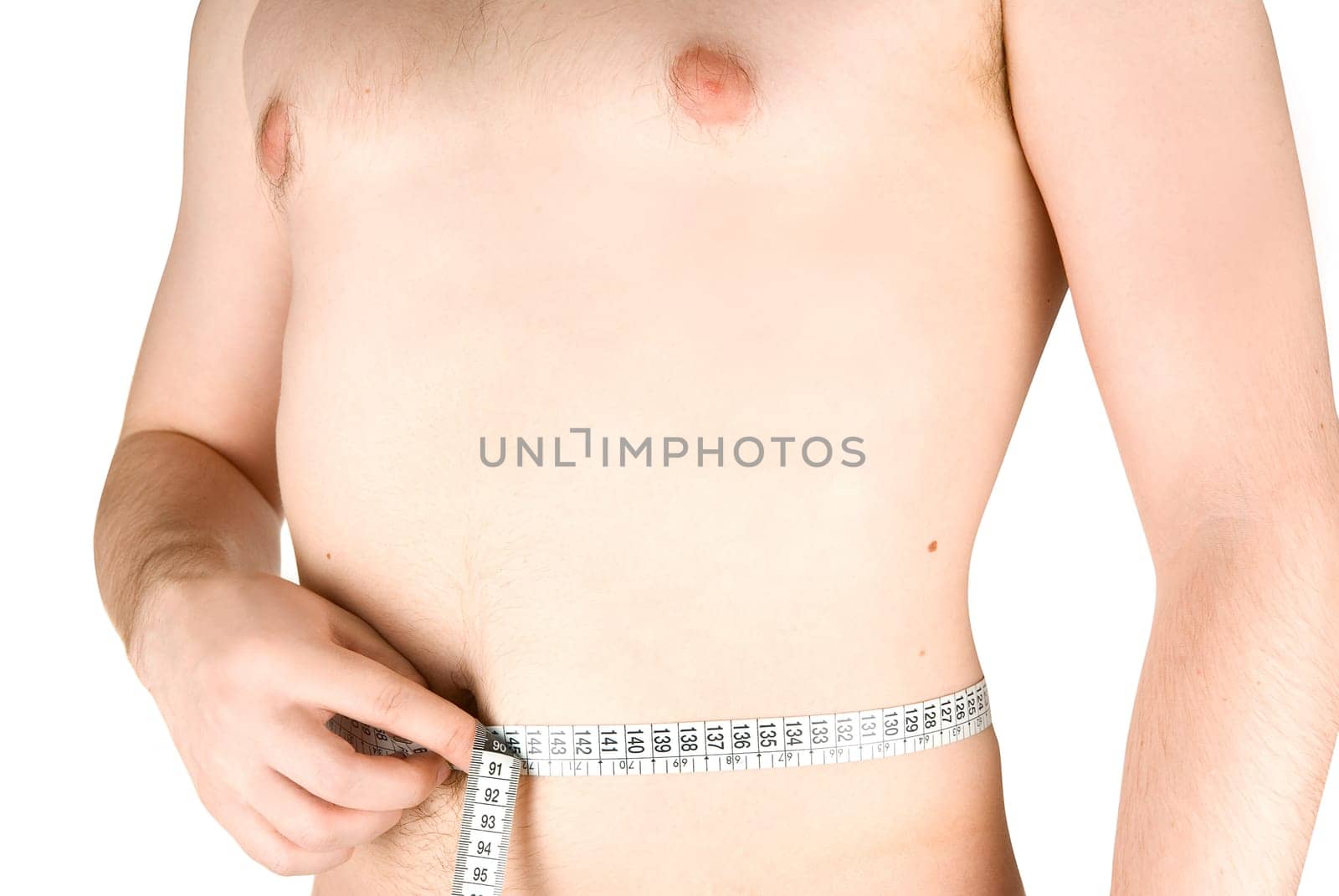 Young man measuring his body, isolated on white background