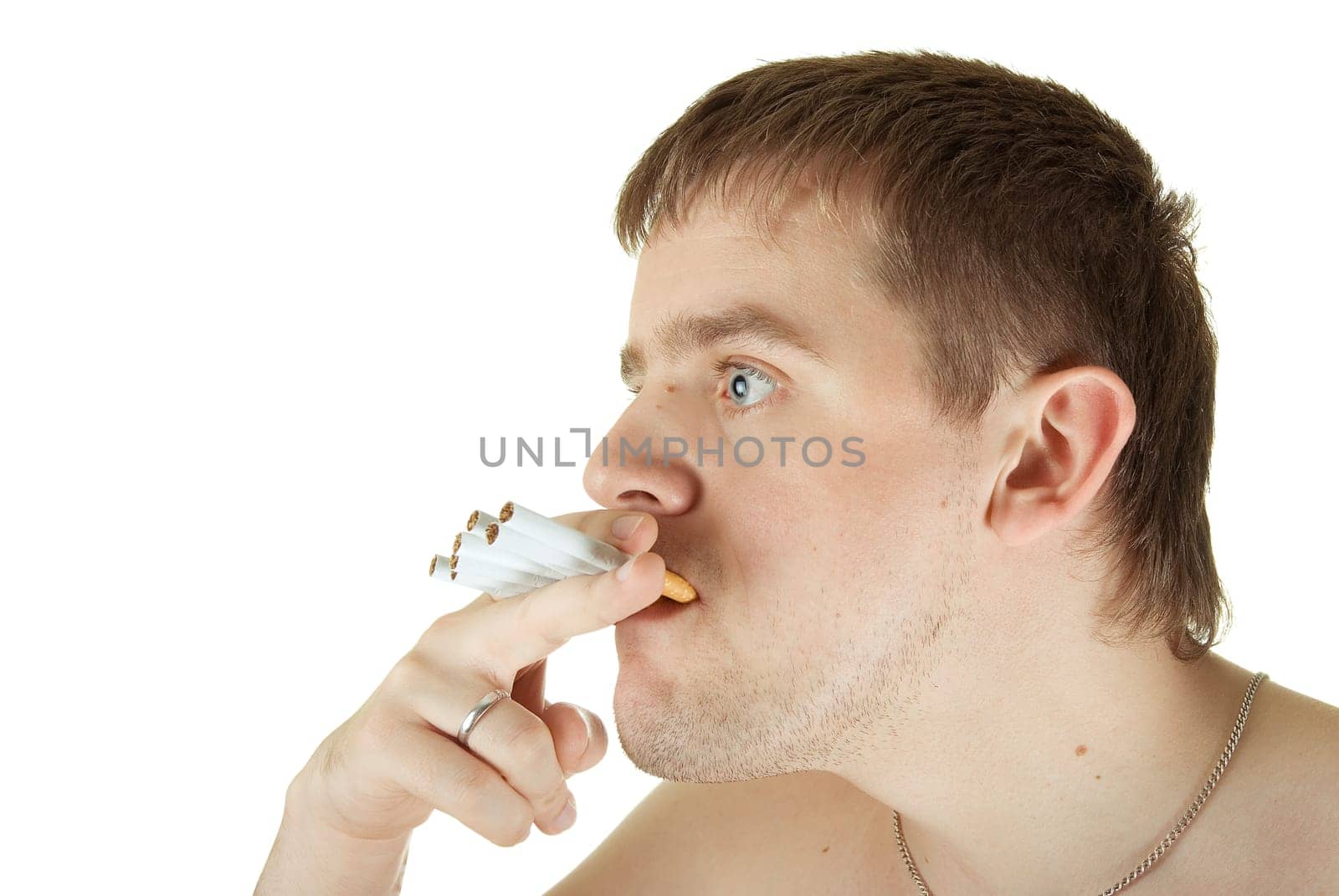 young man with many cigarettes in his mouth