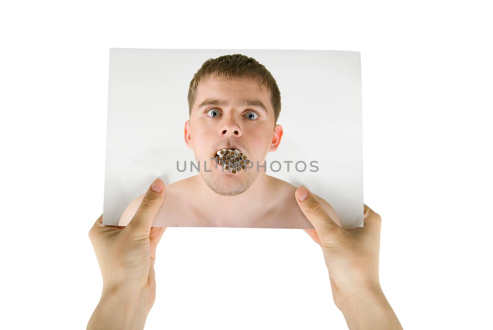 Human hand hold photo of young man with many cigarettes in his mouth