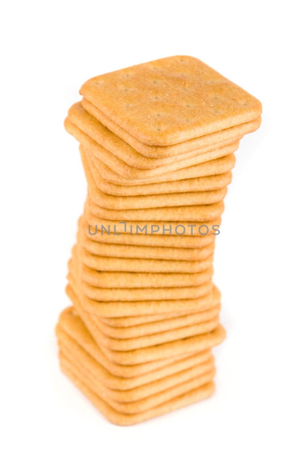 Stack of crackers isolated on white background