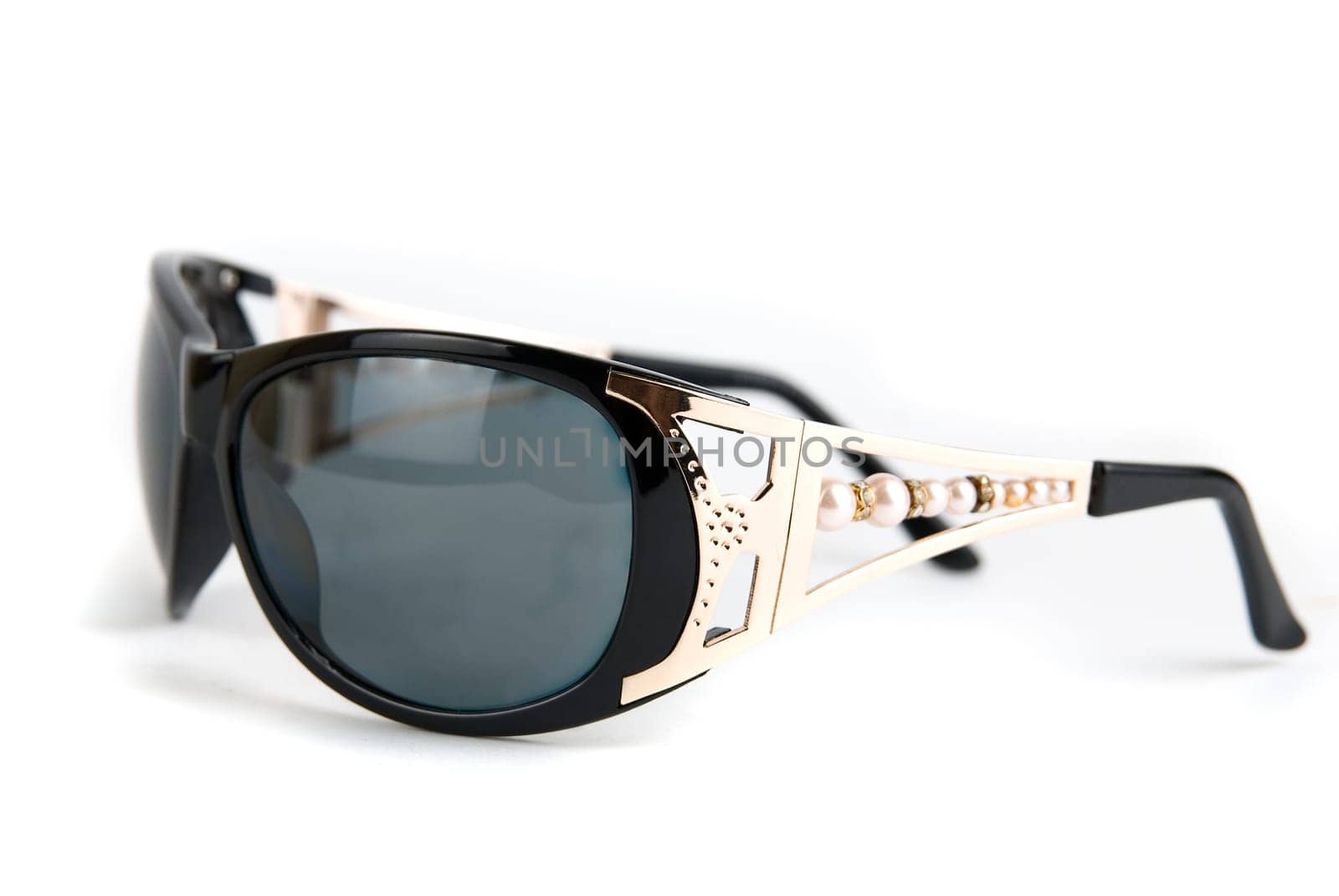 Female modern sunglasses isolated on white background