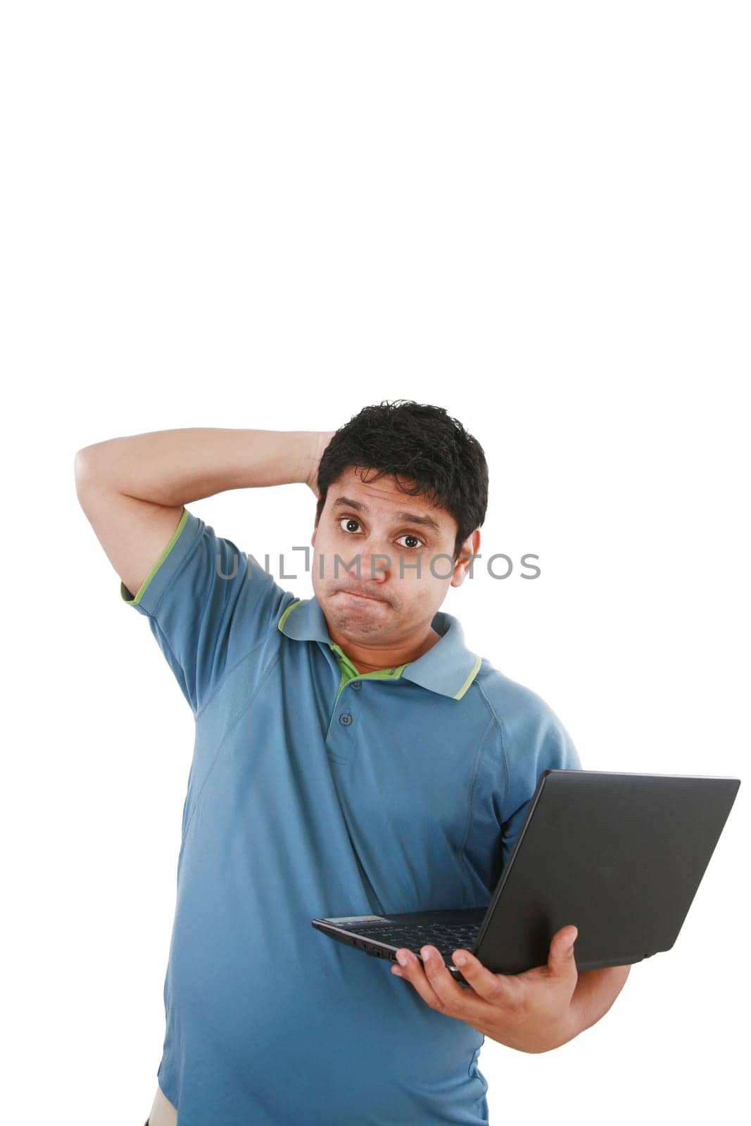 Worried young sman working on laptop