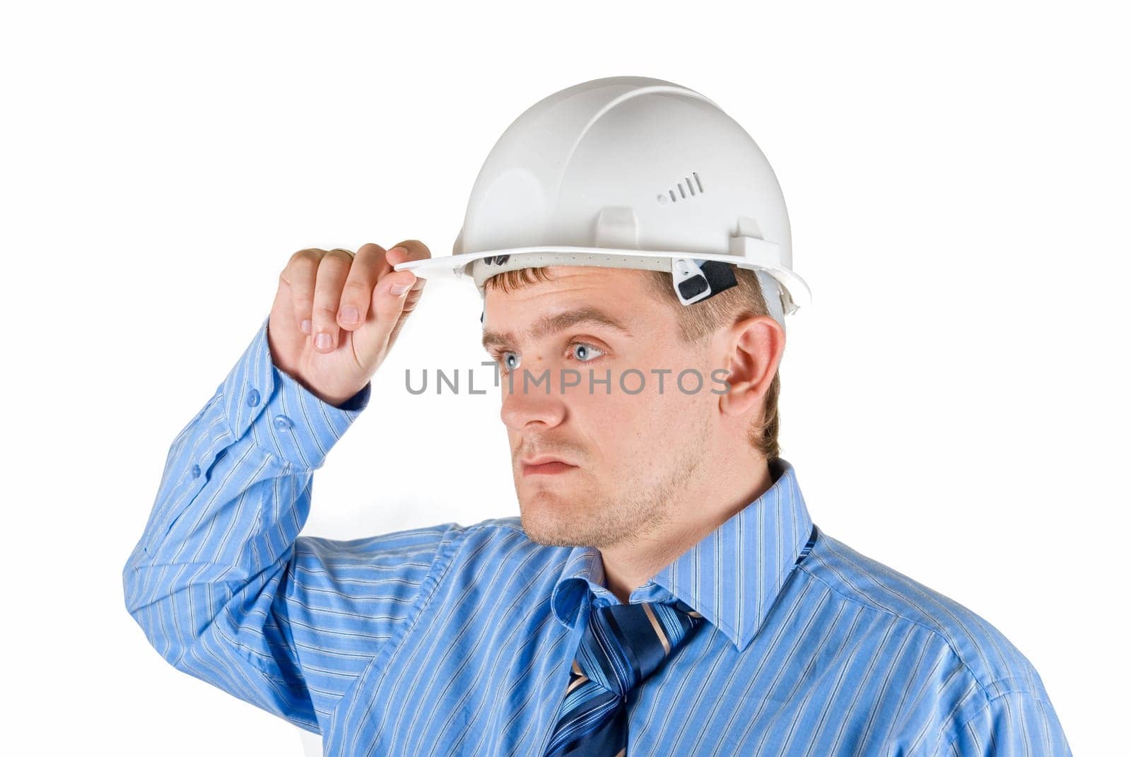 Young man at white helmet isolated on white