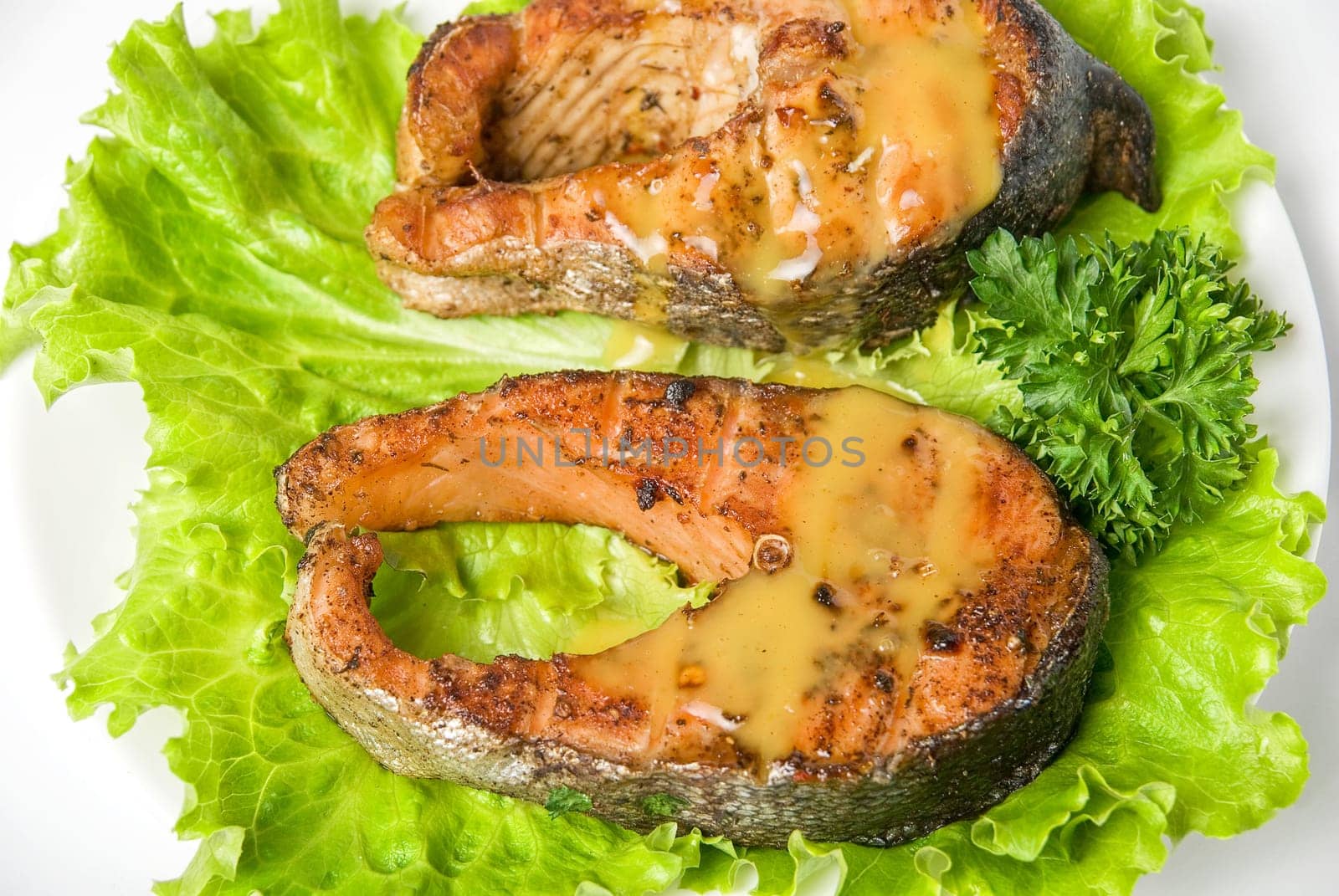 Roasted chum salmon fish dish isolated on a white background