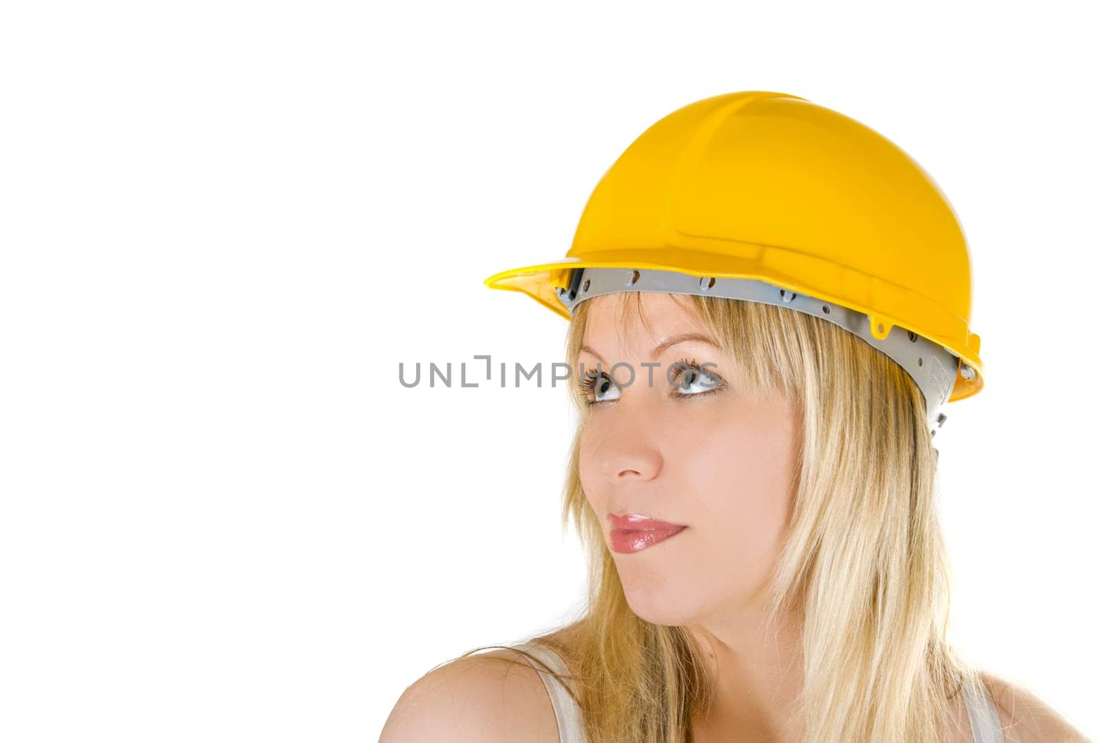 pretty woman in yellow building helmet isolated on white