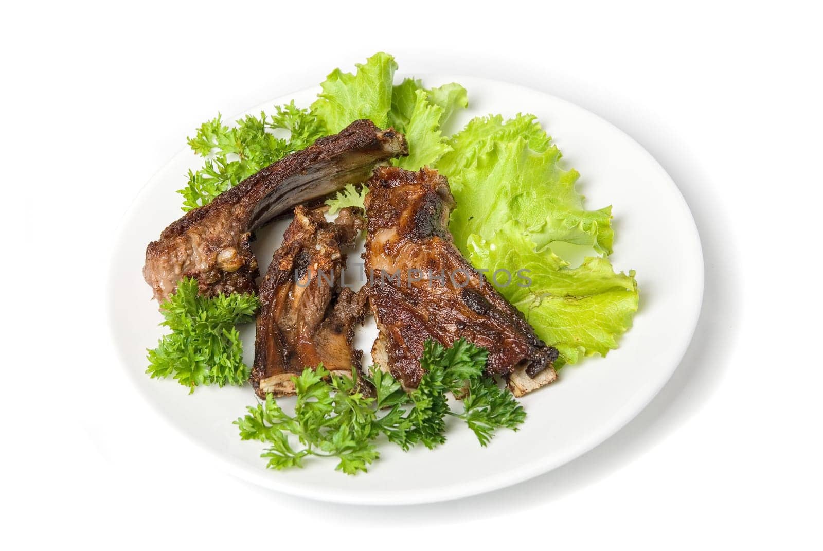 Grilled lamb meat and vegetables isolated on white background