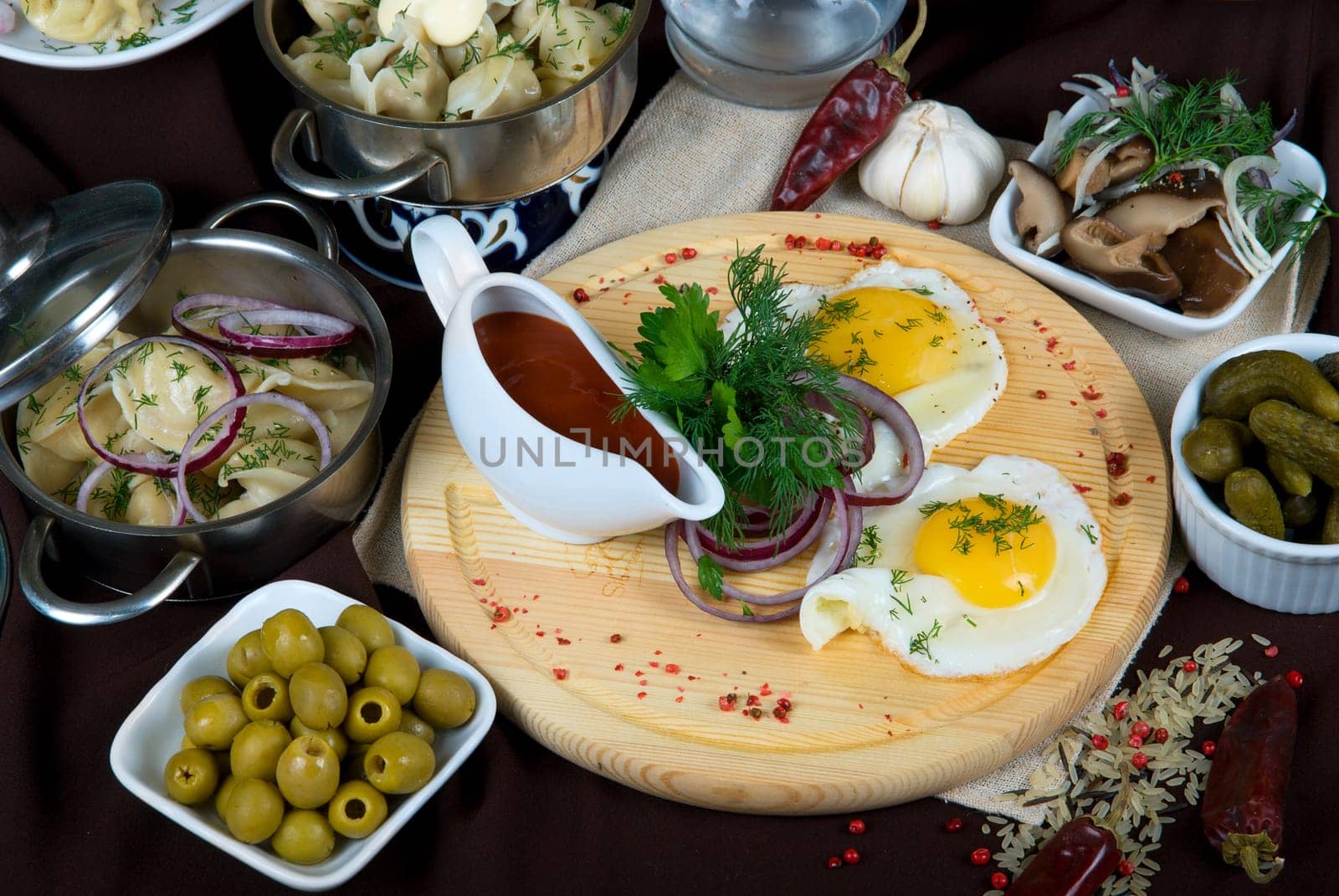 Many food dishes on the restaurant table. close up.